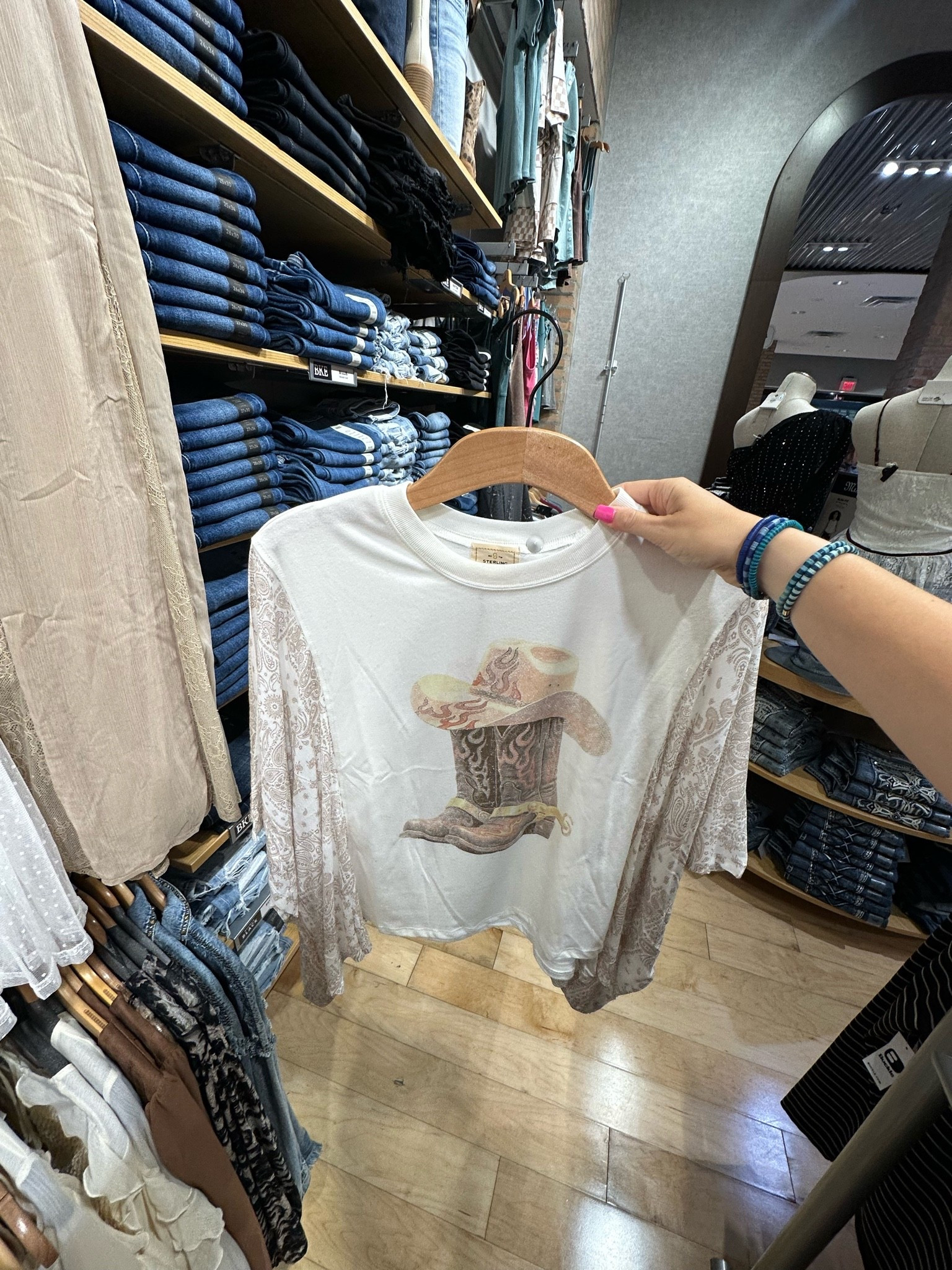 Love this boots & hat flowy t-shirt from buckle! So cute! Priced at $39 & ranges from sizes XS-XL!

#LTKMidsize #LTKPetite
