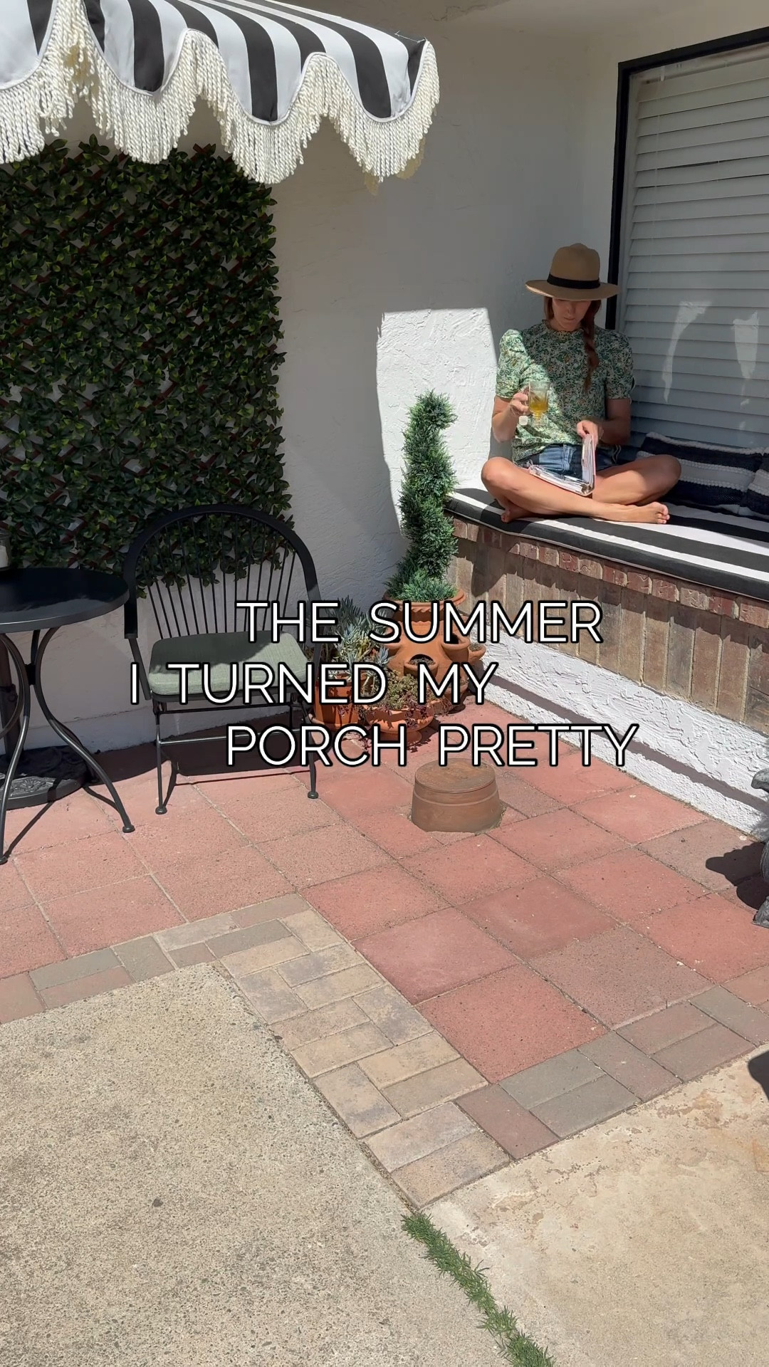 Porch decor, cozy porch, window seat, Mediterranean style, classic home, bistro, black & white stripe, custom cushion, patio umbrella, planters, terracotta, faux greenery, UV rated plants, outdoor plants

#LTKHome #LTKStyleTip #LTKSeasonal