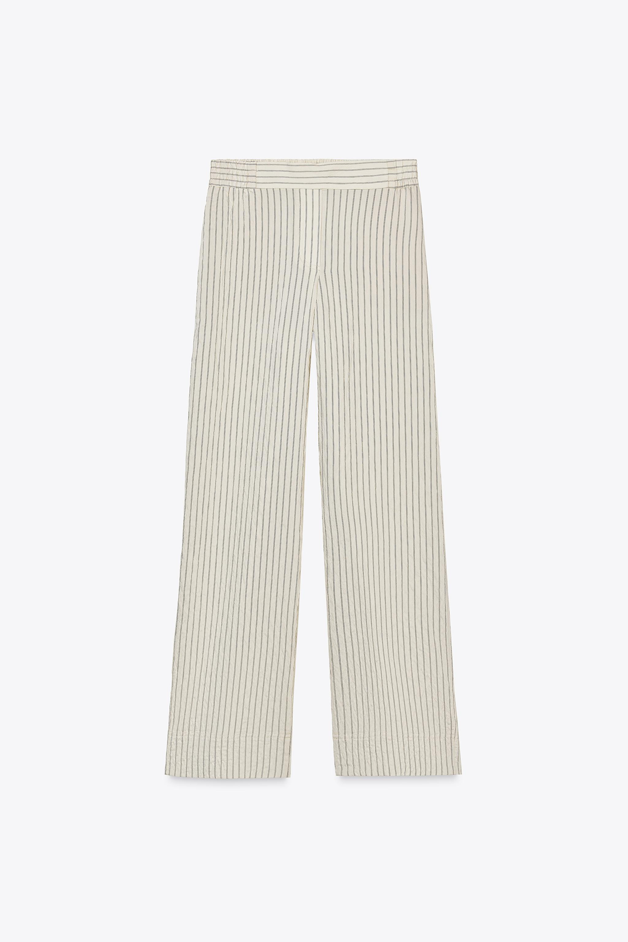 High-waisted pants with elastic waistband. Hidden in-seam side pockets. Wide leg. | Zara US