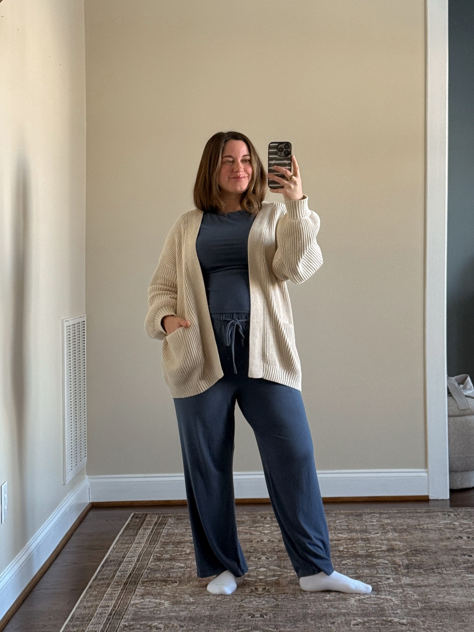 WFH cozy + bump friendly - wearing a large, did shrink a little in the wash FYI! May want to size up and/or wash/dry on delicate.
Fav cardigan to throw on, amazing quality! True to size, fits slouchy 

#LTKBump #LTKmomlife #LTKootd