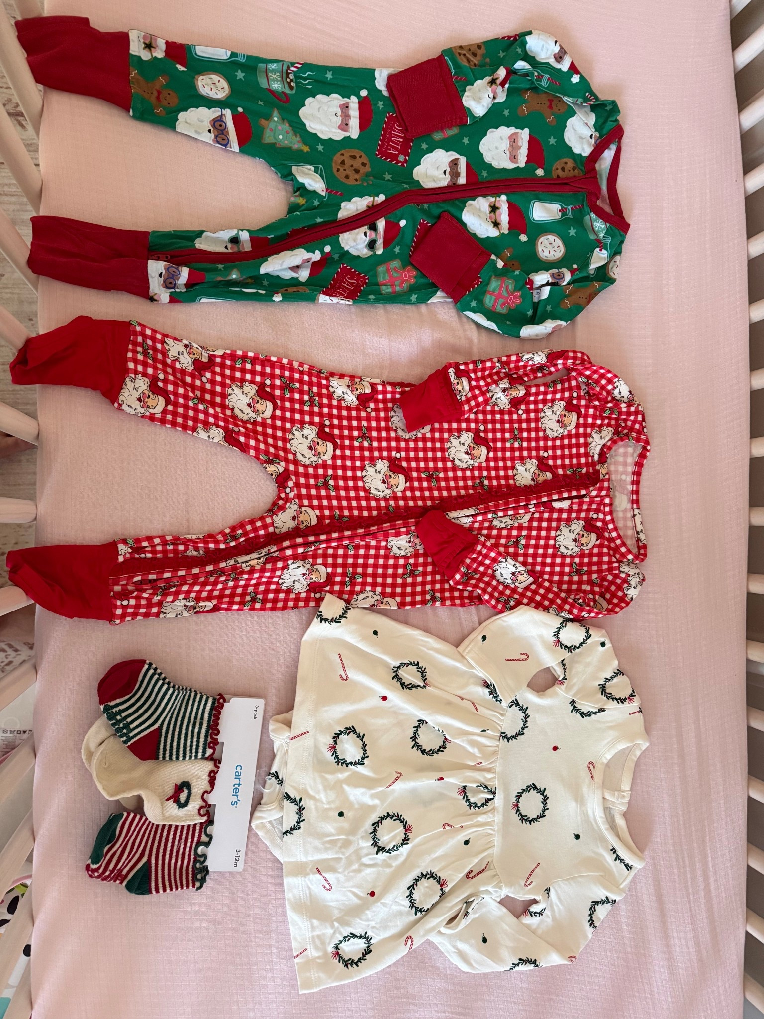 Starting our Christmas collection!
The red Santa sleeper is Rufflebutts brand. 🙂
#babysfirstchristmas #christmasclothes #christmaspajamas 

#LTKBaby #LTKFindsUnder50 #LTKSeasonal