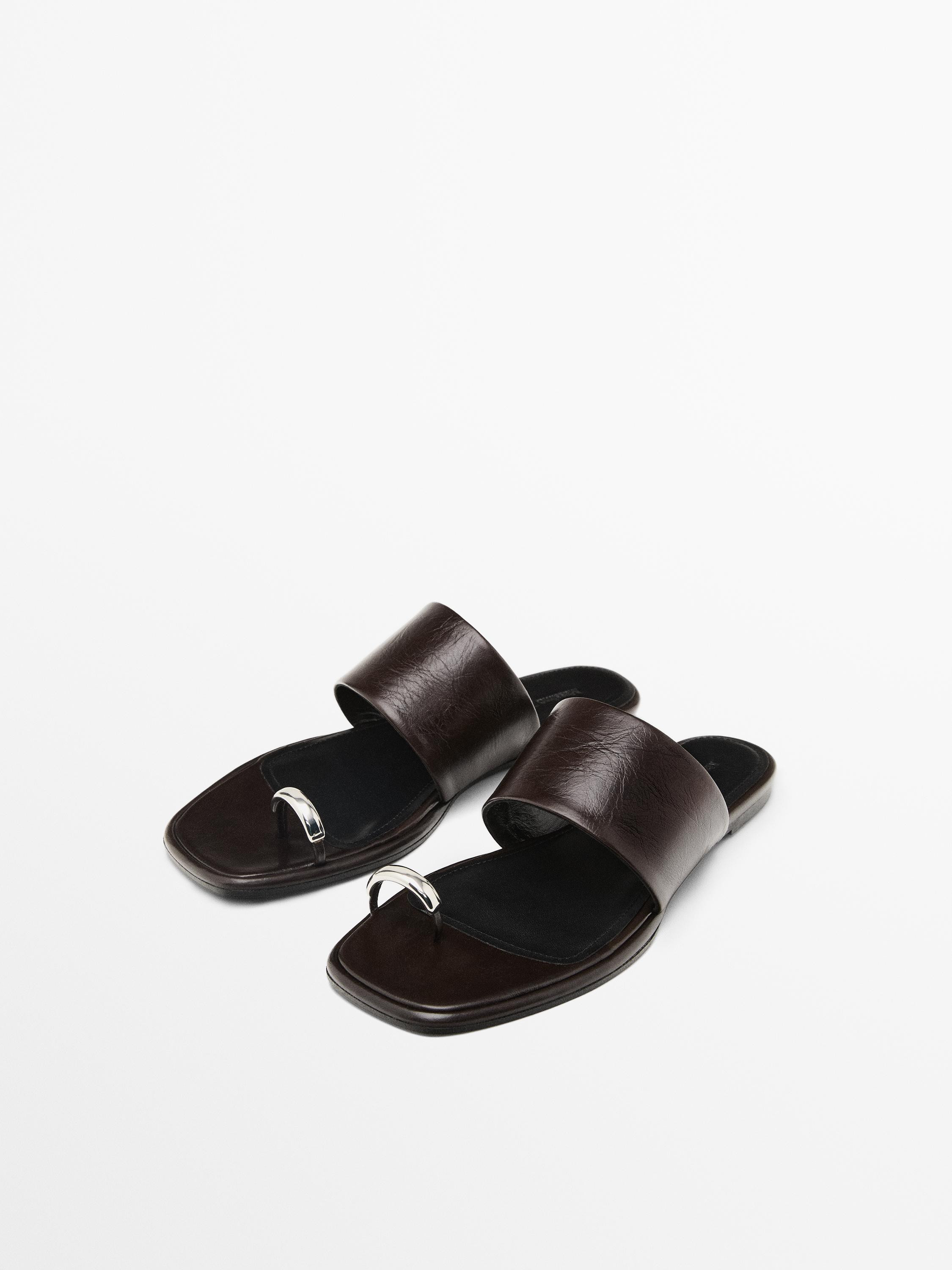 NEW INLeather flat slider sandals with ring detail
    
 $200.00  Add to basket  SELECT SIZE | Massimo Dutti US