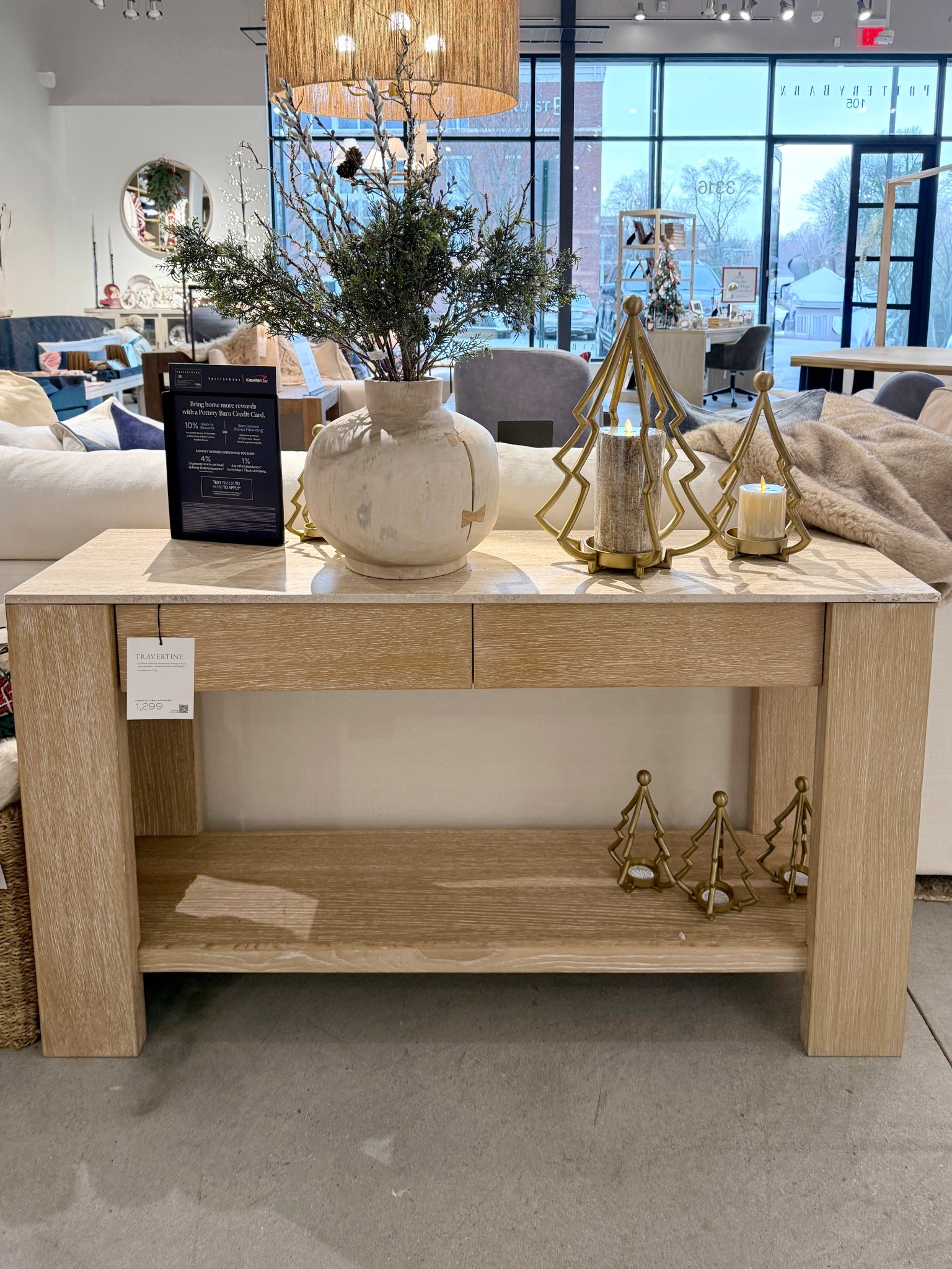 Quietly striking and beautifully balanced! ✨ This Travertine Console Table from Pottery Barn brings an organic, elevated look with its natural stone top and warm wood base. Styled with subtle gold Christmas accents for a seasonal moment, yet timeless enough to live effortlessly in your space all year long. 💫 A perfect blend of natural texture and refined design. Linked similar styles for the same elevated vibe! 🤩 #ConsoleTable #NeutralDecor #PotteryBarnHome 

#LTKSaleAlert #LTKHoliday #LTKHome