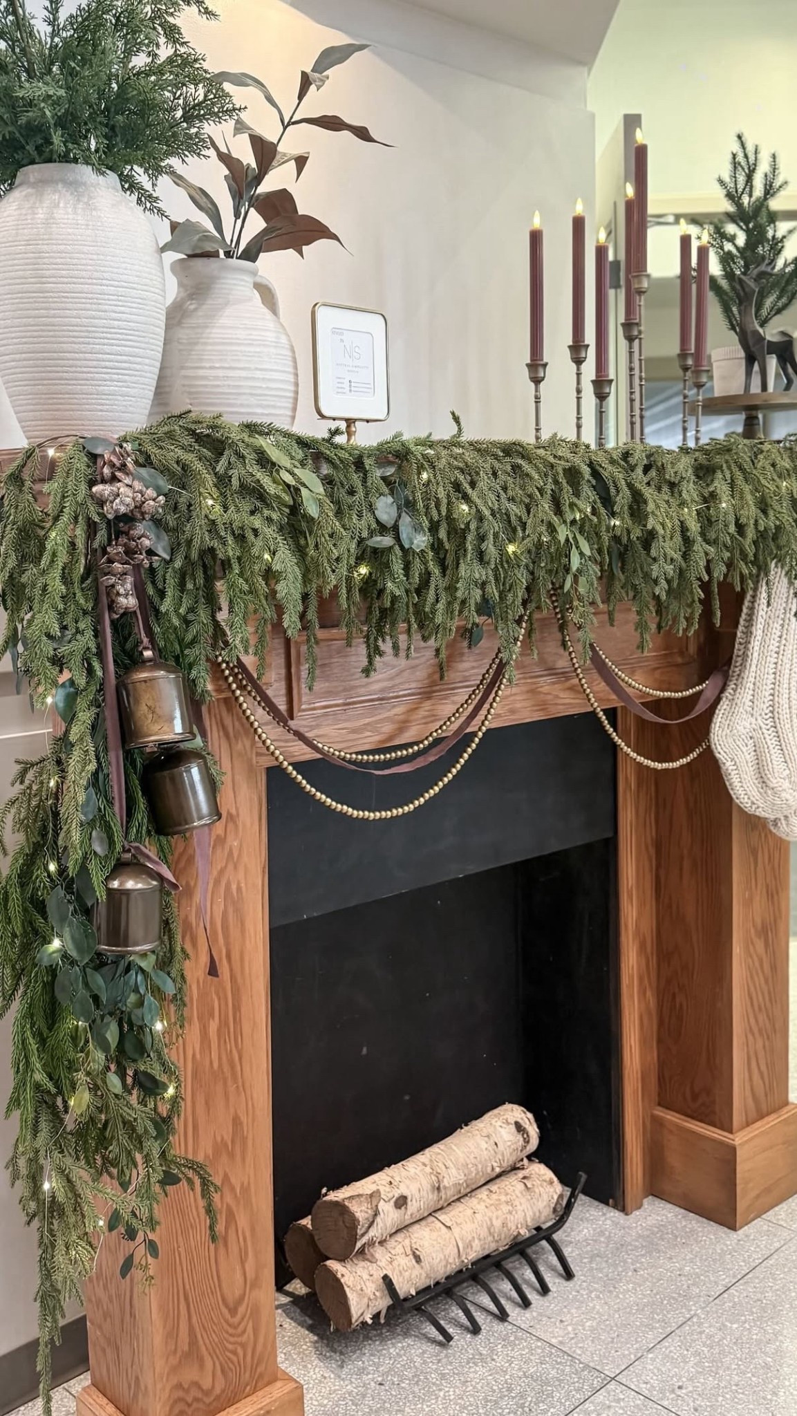 Mantel styling with faux Norfolk Pine garland 

#LTKHoliday #LTKHome #LTKSeasonal