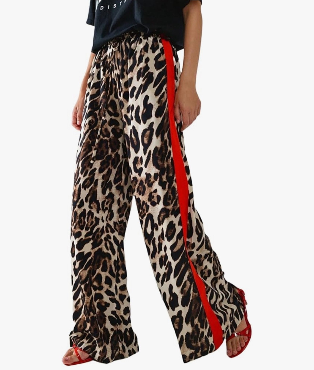 Bold, chic, and comfy ✨ These leopard print wide-leg pants with a pop of red are perfect for making a statement. Style them with a simple black tee or dress them up with heels for an effortless street-style look. 🐆❤️

#LTKMidsize #LTKFindsUnder50 #LTKSeasonal