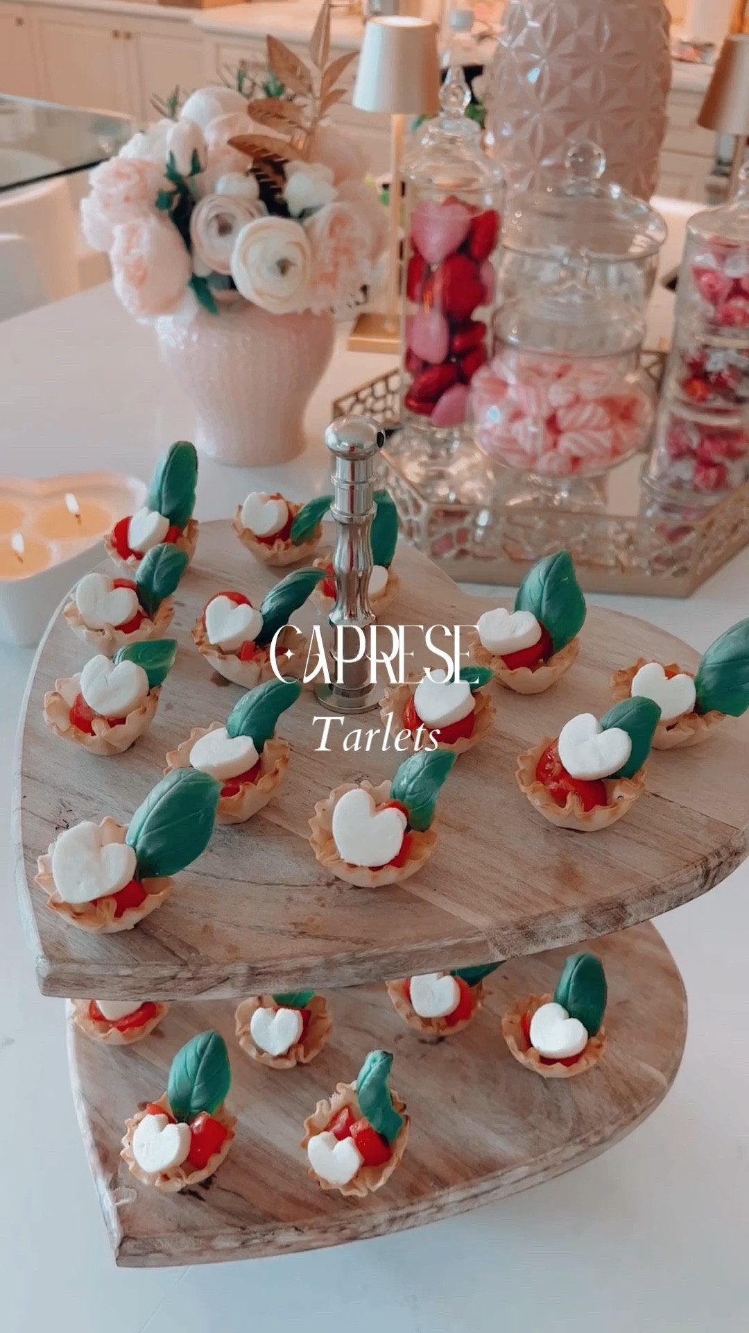 Do you want to add a touch of irresistible cuteness to your next cocktail party or Valentine’s day? Yes? Then these Caprese tartlets are for you. Ready in minutes, and so fun to prepare and serve. 

Ingredients:
Two boxes of cherry tomatoes
One mozzarella log
One fresh basil plant
Two boxes(30) frozen phyllo cups
salt, pepper, and olive oil.

Cut the cherry tomatoes, season them lightly, and cut the mozzarella with this fantastic cutter(it’s part of a large set with many shapes, so I’ll use them year-round). Fill the cups with the tomatoes, add the garnishing, and they are ready!
You can shop this post on my LKT page(link in bio) or comment “Veggie Cutter” below, and I’ll send you the link. 

#LTKhome