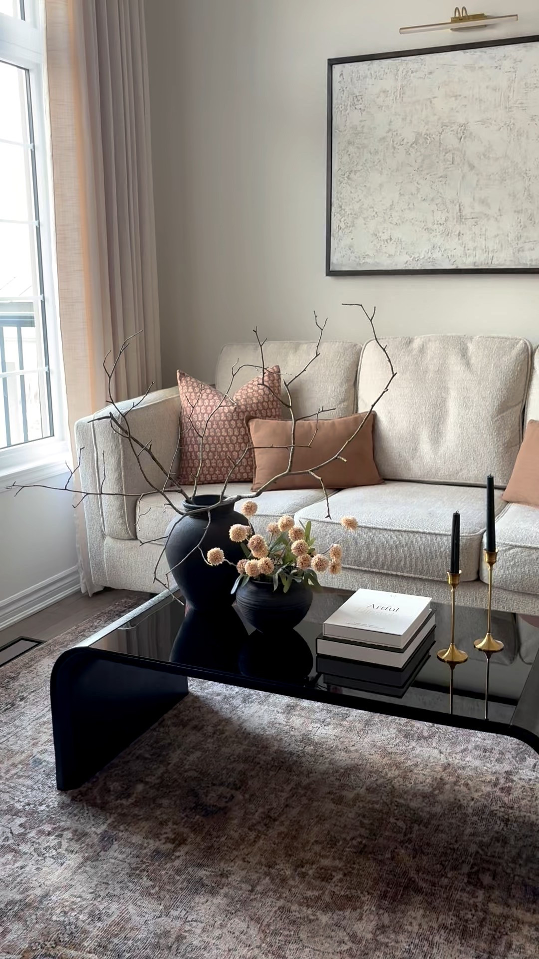 Simple winter coffee table styling✨

Love how these delicate flowers interwoven together with those branches. It creates a beautiful contrast and organic texture. 

Simple doesn't mean boring, it means intentional.

Living room details, winter home decor, winter throw pillows, coffee table, coffee table decor, Branches, faux branches, vase

#homeinspo #neutralhome 

#LTKwinter #LTKsale #LTKhome #LTKfamily