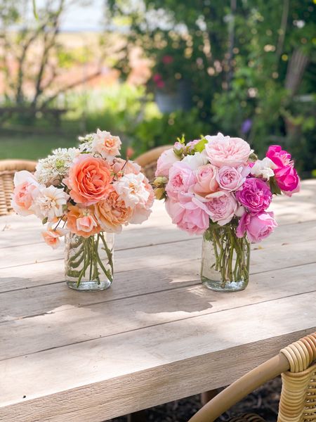 Outdoor tablescape. Outdoor dining chairs. Outdoor wicker dining chairs. Outdoor dining table. Mason jars as vases. ❤️ 

#LTKSeasonal #LTKHome #LTKParties