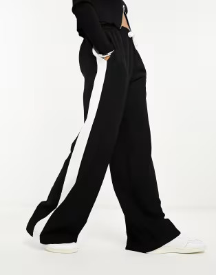 ASOS DESIGN pull on pants with contrast panel in black | ASOS (Global)