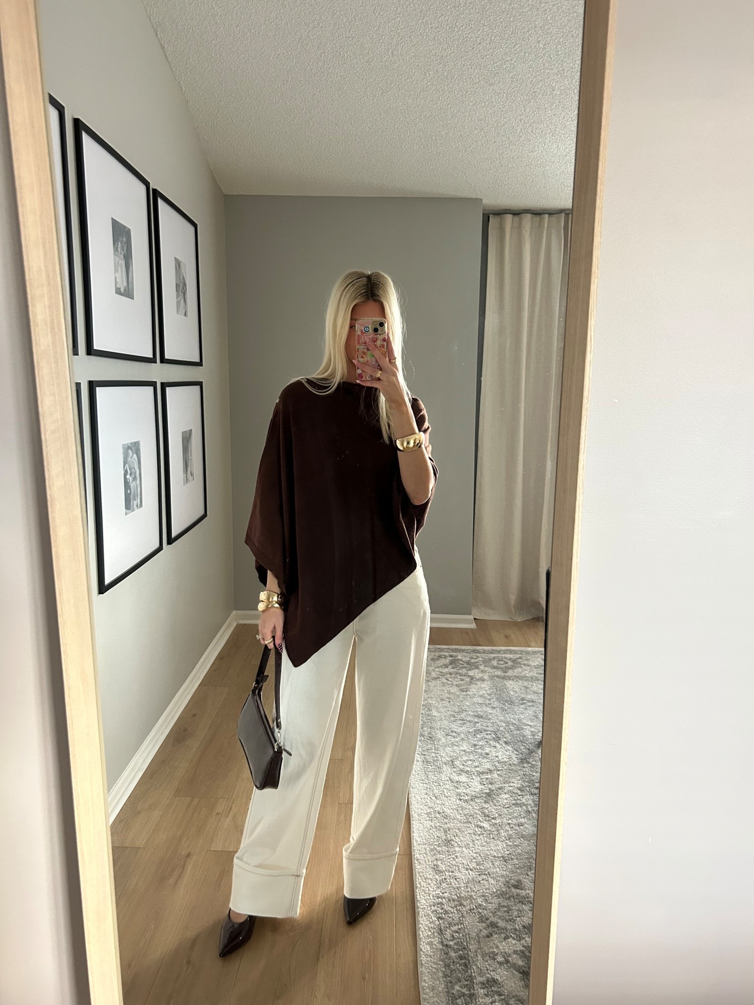 Love this brown poncho top! Wearing my favorite Lioness white denim pants. 

#LTKootd #LTKSeasonal #LTKFindsUnder100