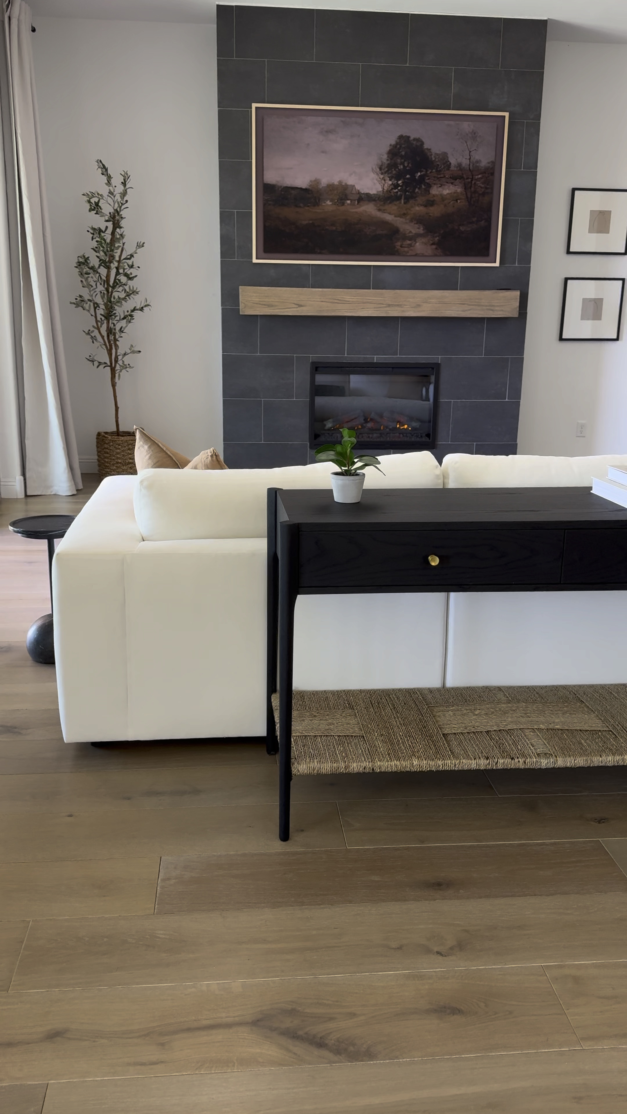 This Dana Console Table from McGee & Co is everything I dreamed of. The quality is amazing and the wood grain looks stunning in person. 

Living room, sofa, Pottery Barn Sectional, McGee & Co Dana Console, Fireplace 🤍



#LTKHome #LTKSeasonal #LTKSummerSales