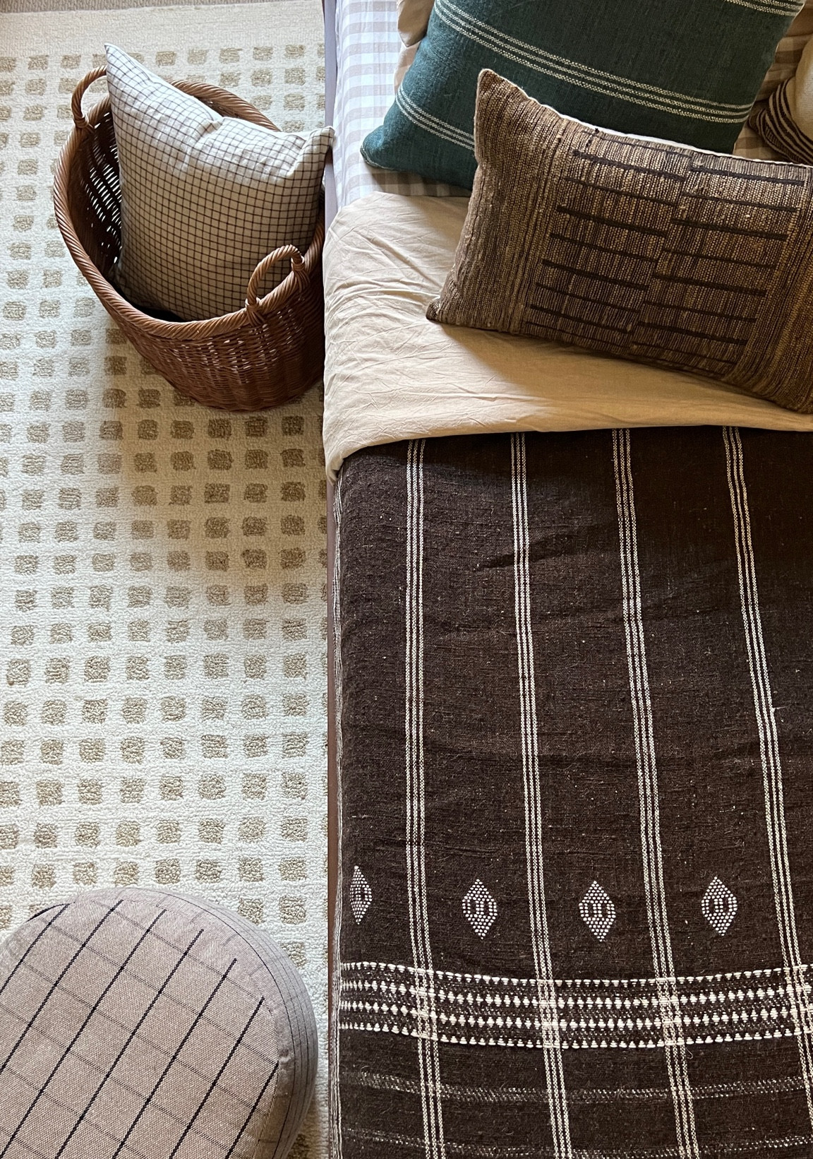 Neutral toddler bedroom 

Indian wool blanket check rug plaid pouf ottoman moody dark tan woven pillow natural duvet cover gingham sheets blue striped pillow cover 

#LTKhome #LTKsalealert #LTKkids