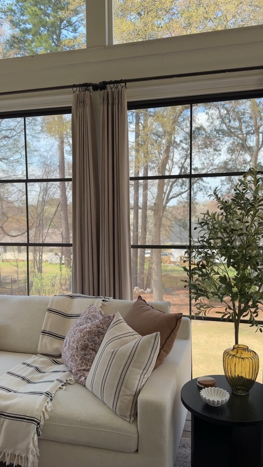 Three seasons room, outdoor living, modern sectional, white sectional, interior define sofa, three seasons room decor, living room furniture, living room design, Amazon curtains, Amazon pillows, coffee table, living room rug

#LTKHome