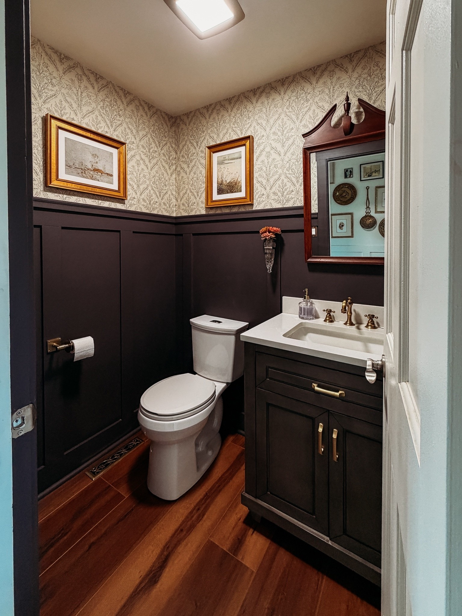 Rich, moody, and warm. Our powder room is small but mighty and with the new addition of this antique car vase, it’s perfection

#LTKHome