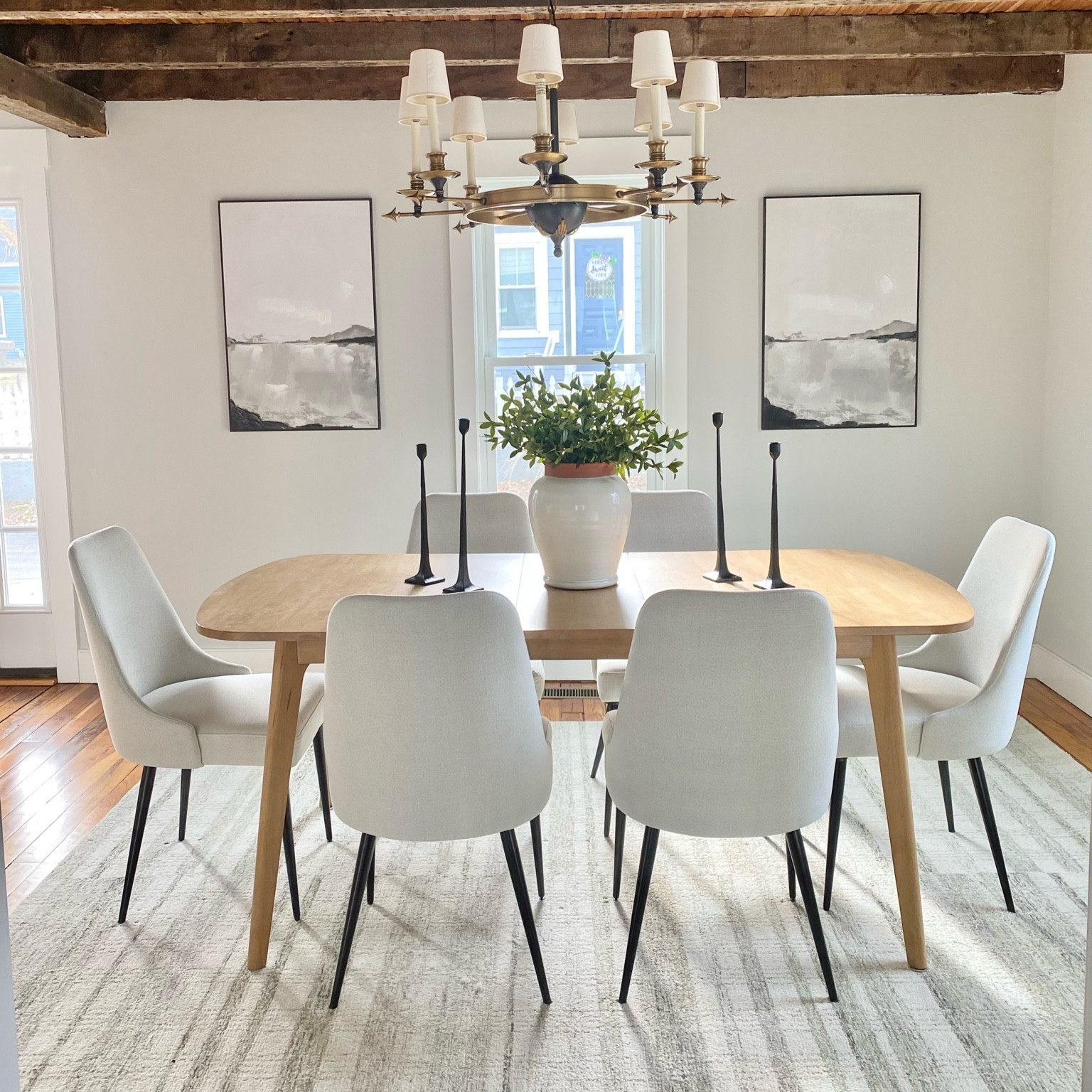 Classic and elegant dining room.  Upholstered cream chairs, Target find extension table, striped rug.

#loloirug #chrislovesjuliarug #diningroom #diningroominspo

#LTKhome