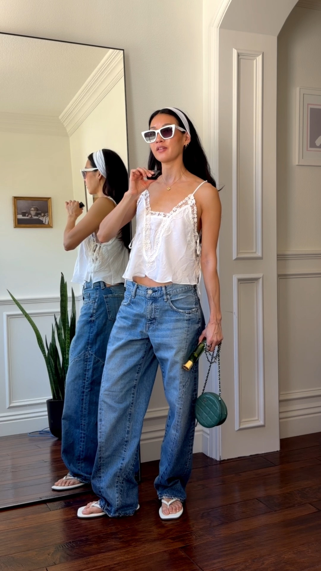 The perfect spring boho top with lace trim and ties. Great with jeans or a skirt!

Also got hooked on Vivrelle, the member club to borrow luxury, designer bags. Got you a month free using code: CHRISTINEKONG. How adorable is my mini Chanel?

Wearing xs in top, 24 in jeans for a baggier fit, and the most comfy pair of thing sandals (I have them in two colors)! 

#LTKPetite #LTKOver40 #LTKootd