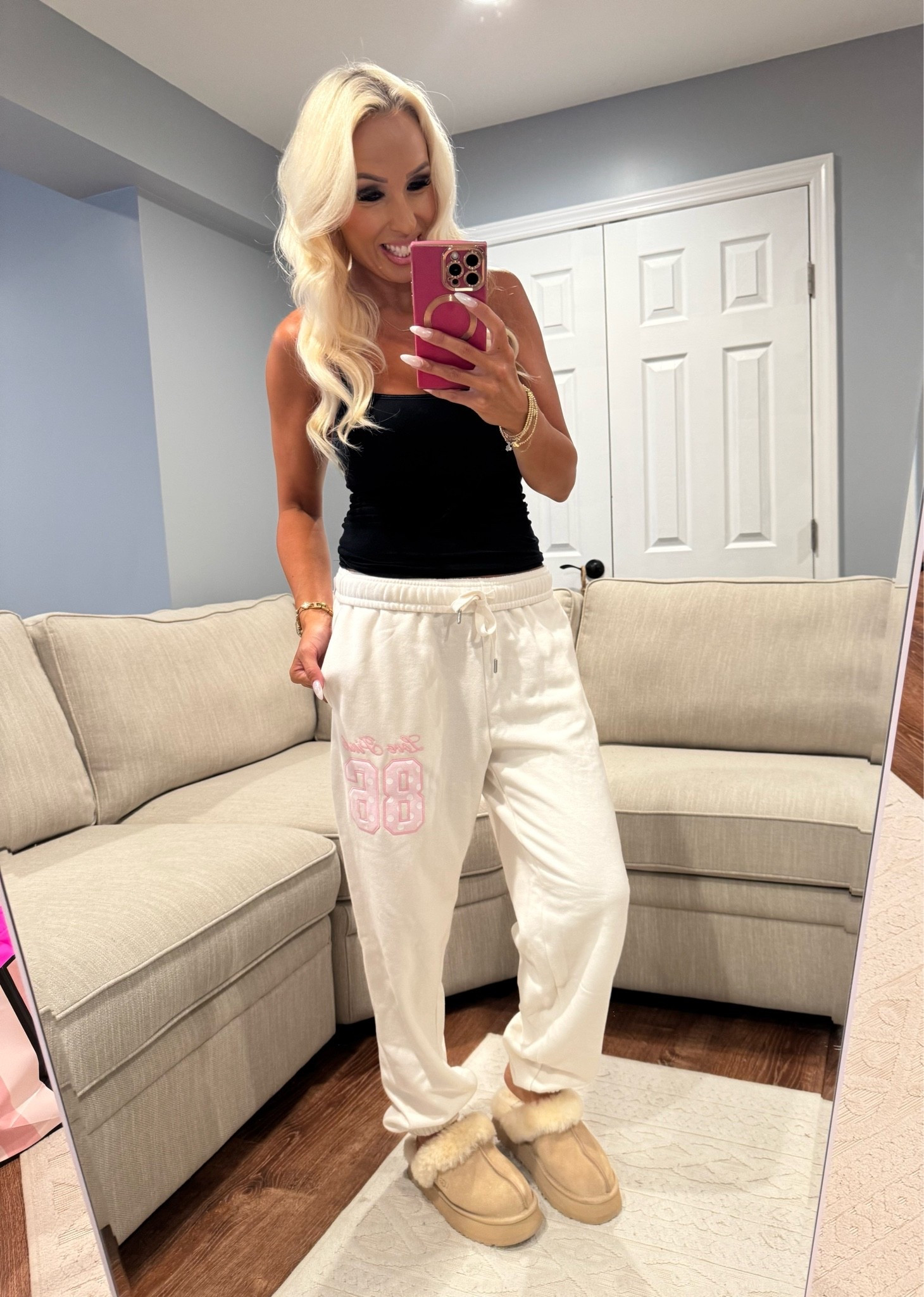 Cozy everyday outfit 🤍 These comfy oversized sweatpants are the perfect mix of cute + casual! I paired them with a simple black tank and cozy slippers for an easy fall lounge look. Perfect for coffee runs, errands, travel days or just staying comfy at home. ☕️✨

#LTKootd #LTKmomlife #LTKmorningroutine