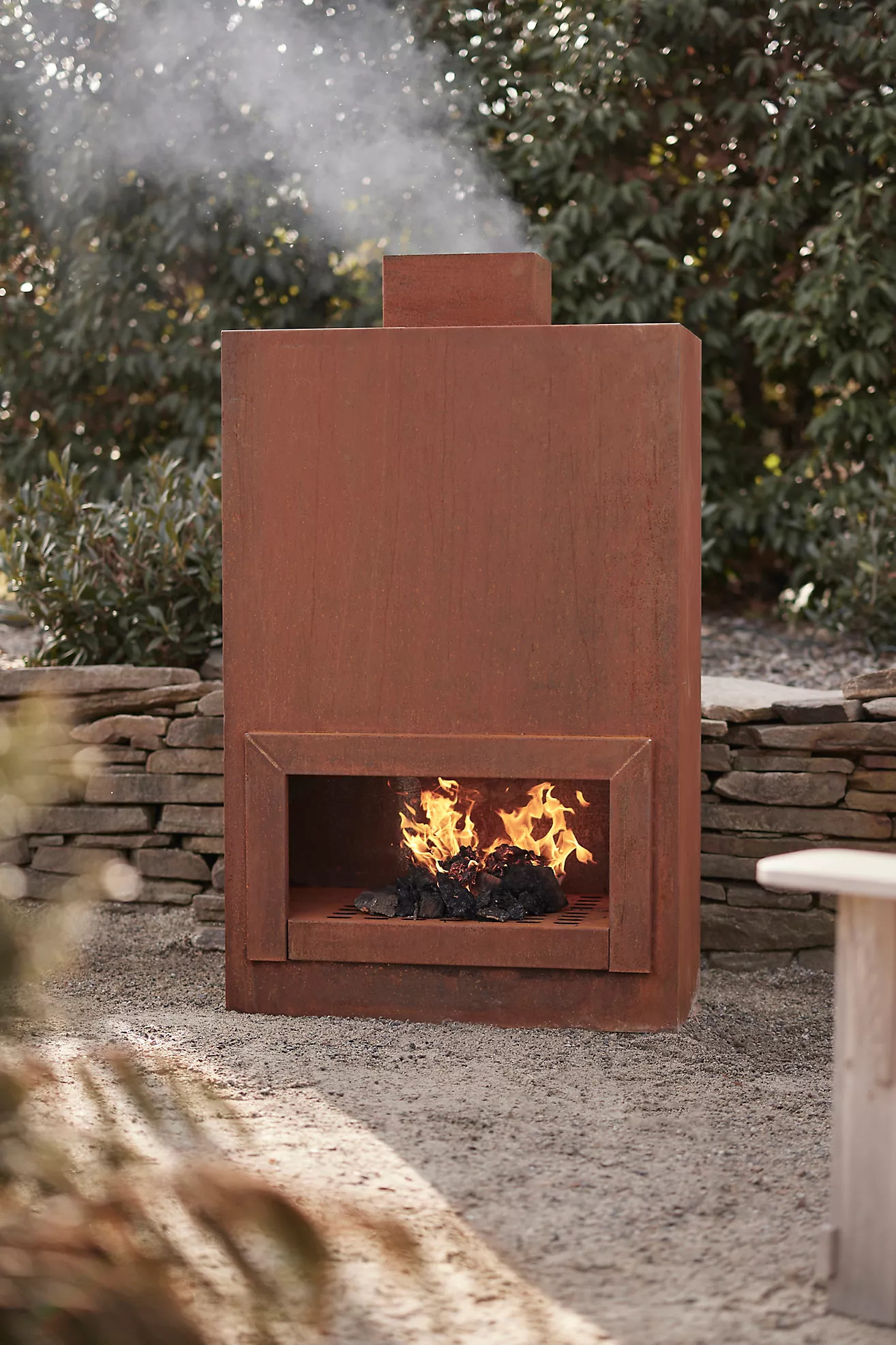 Weathering Steel Planed Outdoor Fireplace | Terrain