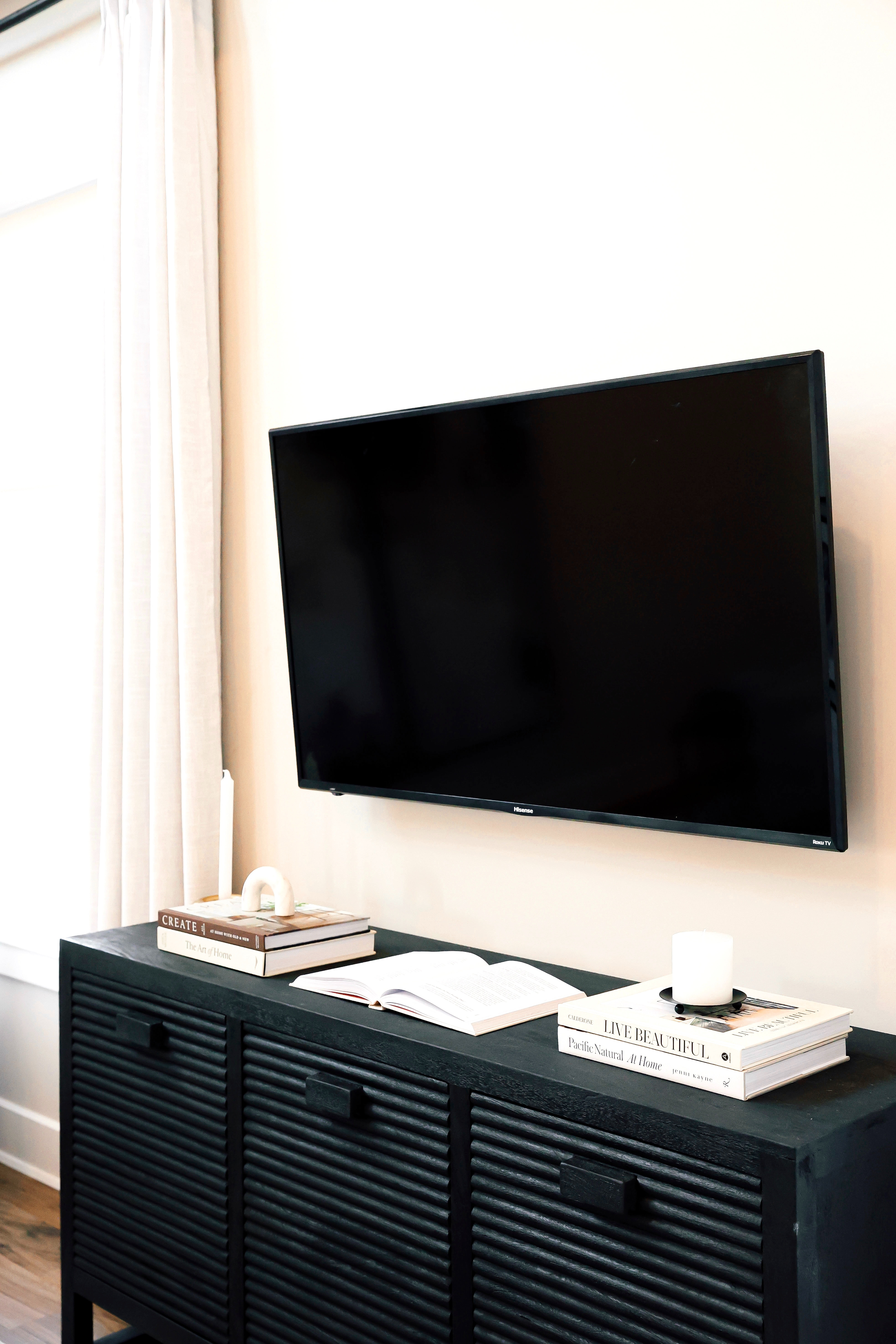 Home Décor and Styling. Living Room Furniture. Rug, Décor books, Candle Holder, Candles, Pillar Candle Holder, Black TV Stand, Black Sideboard, Black Console Table. Home Décor Styling Tips! Simple Home Styling. Simply Styled. Organic Luxury Living. 

 #LTKHome #LTKFindsUnder50 #LTKStyleTip