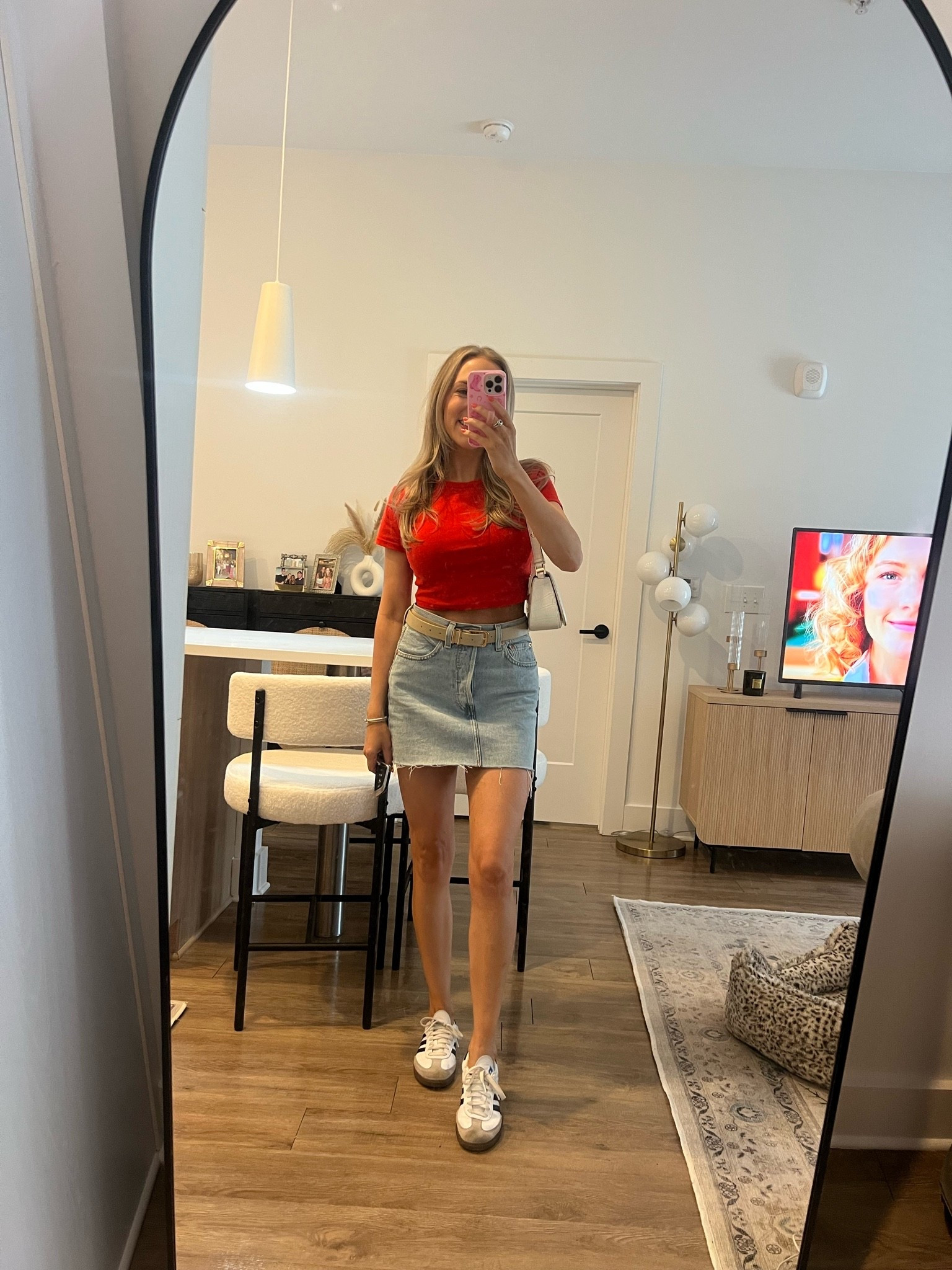 Denim skirt, red short sleeve crop top, samba adidas sneakers outfit

#LTKdayinmylife #LTKgrwm #LTKootd