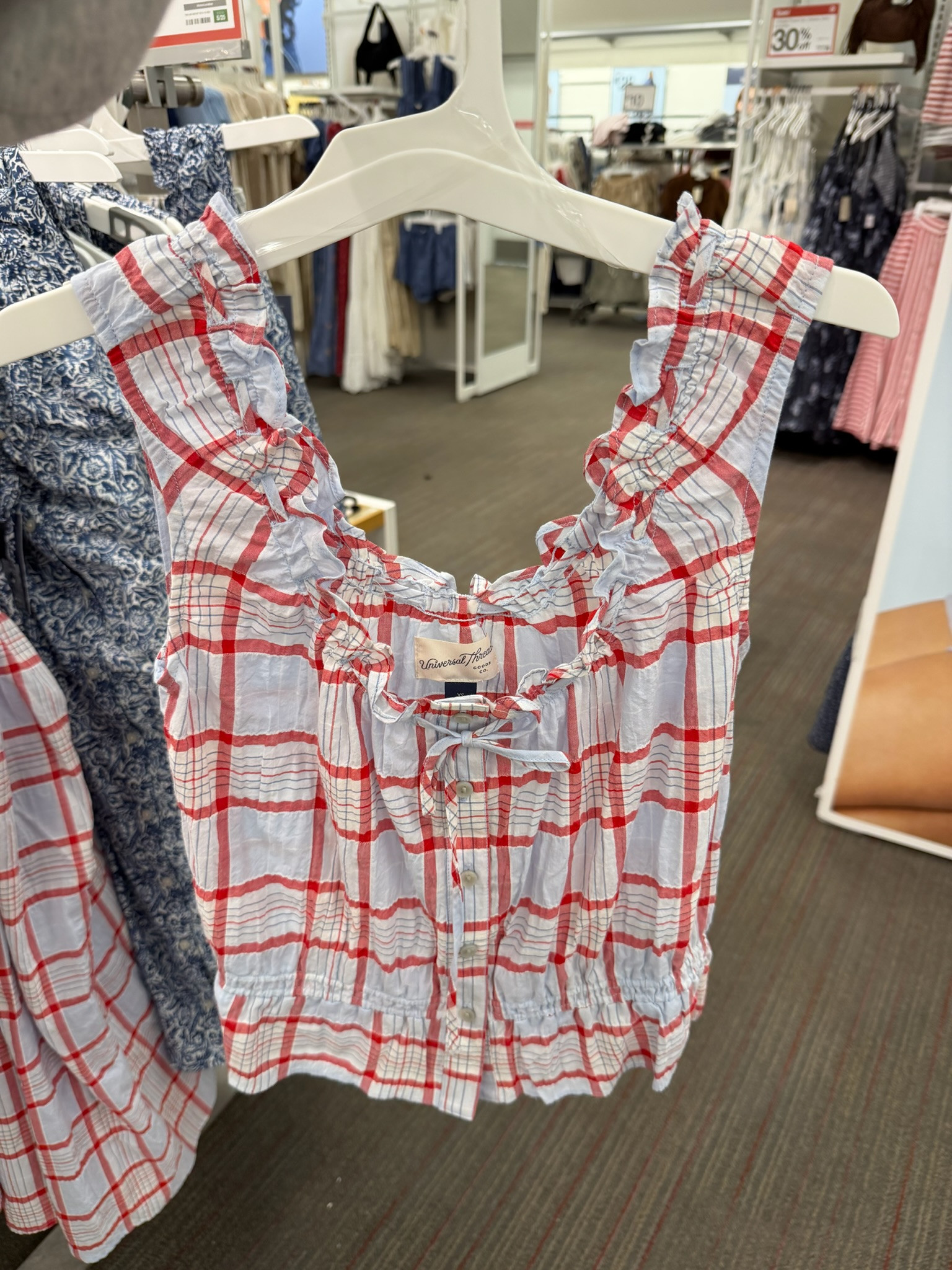 This top is giving Nantucket summer 🤍❤️ The plaid print, ruffle details, and little lace-up neckline make it feel so cute and classic. 

wedding guest dress summer, fathers day gift guide, summer outfits, summer dresses, country concert outfits, fathers day gifts, date night outfits, travel outfits, concert outfits, business casual workwear, plaid top, coastal style, fourth of july outfit, summer fashion, target style, vacation outfits, cute tops 

 #LTKgrwm #LTKootd #LTKSeasonal