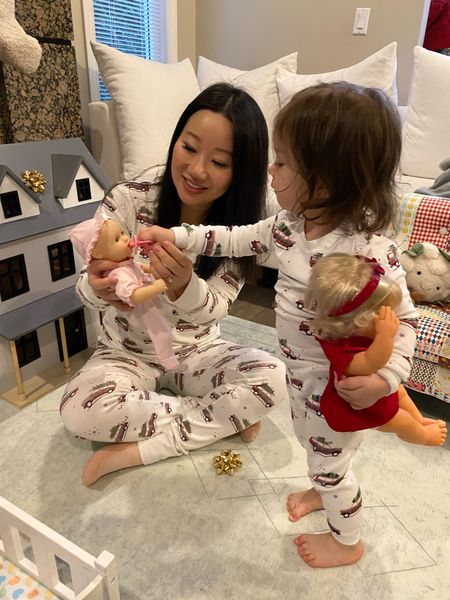 Christmas morning: in our mommy and me matching pyjamas, and April playing with her new dolls and her new dollhouse. Our holiday PJs are on sale, the handmade doll on the right is 40% off. The dollhouse and accessories are on sale too. Everything in the photos is linked! 

#LTKhome #LTKHoliday #LTKfamily