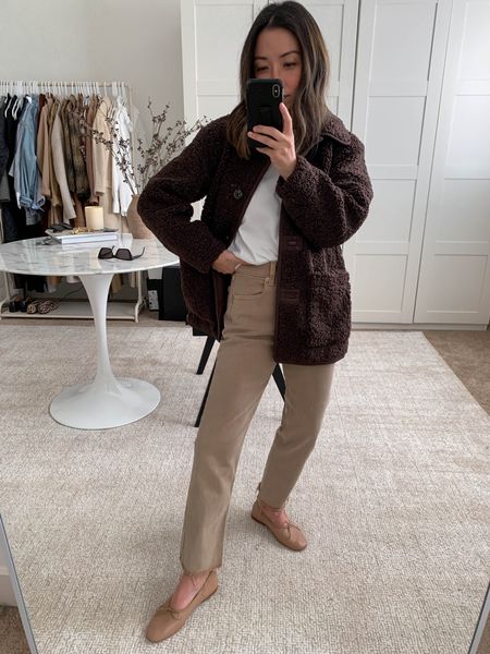 J.Crew teddy jcket. This piece is amazing! And the petite fits so well. Roomy without being overwhelming. Run to get this, it will sell out. 

Jacket - J.crew petite xs
Tee - Everlane medium
Jeans - Gap petite 26. Sized up 2 sizes. 
Flats - Mansur Gavriel 35