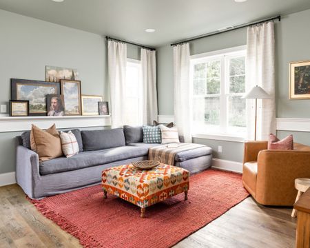 A fun color palette comes together to make this living space bright and inviting.

#LTKhome