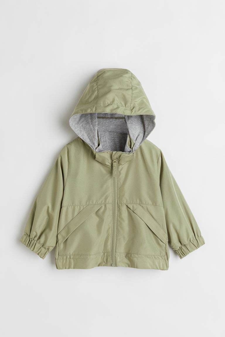 New ArrivalJacket in woven fabric with a slight sheen. Detachable hood, low stand-up collar, and ... | H&M (US)