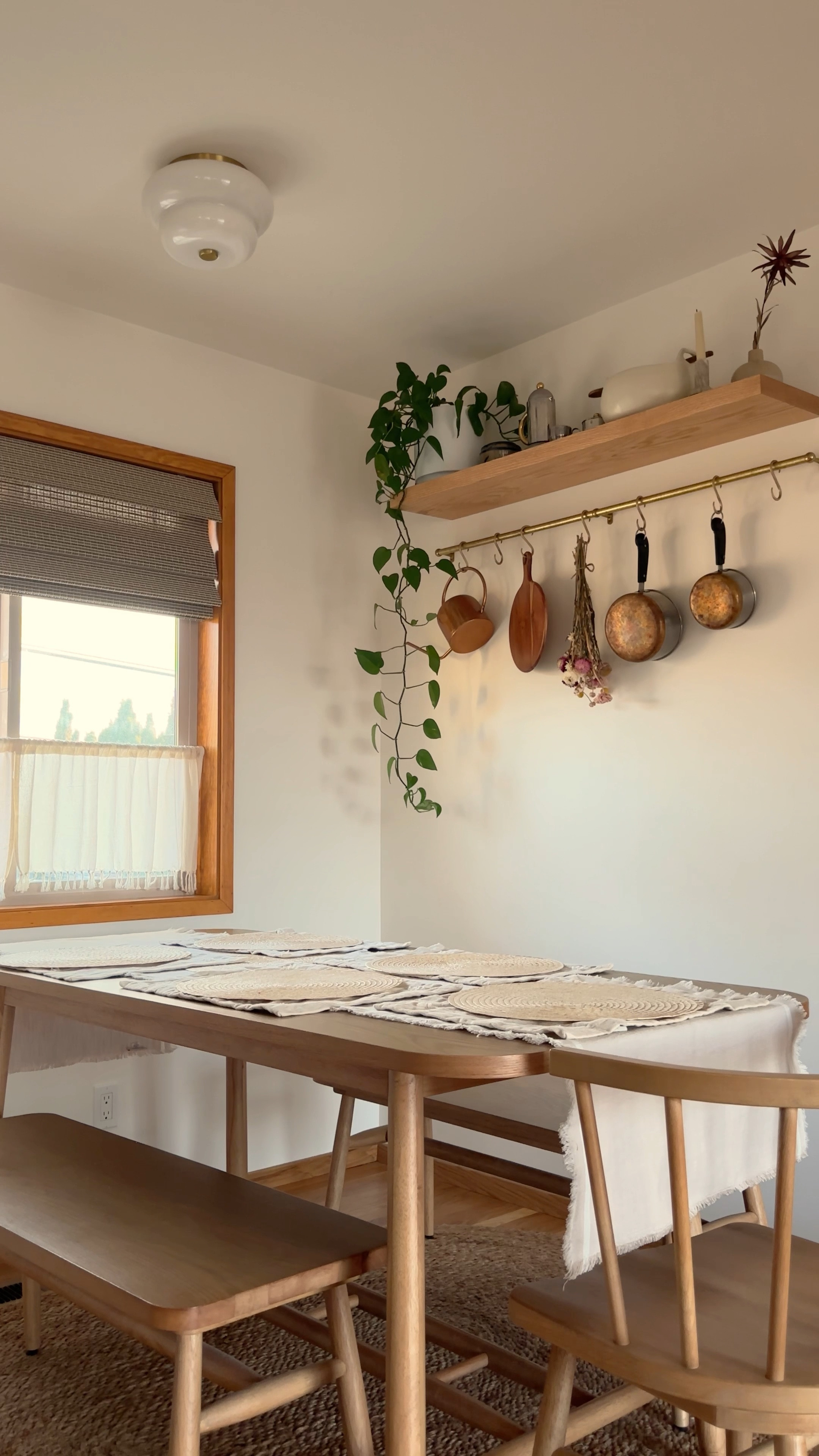 A quiet moment at home in our dining nook. #diningtable #diningnook #brassrail #copperpots #magnoliafortarget

#LTKhome