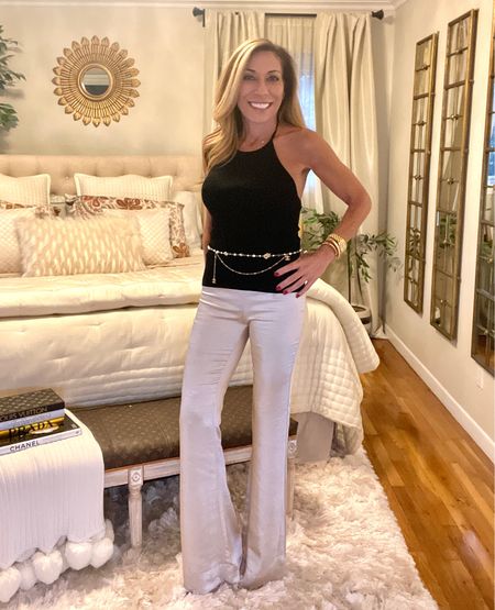 Holiday party ready! ✨
Dying to wear my new belt and I have upcoming parties, so I shopped my closet and found these many seasons old OnTwelfth satin flare trousers from @revolve and an Intermix sparkle top.
This will work! 🥂
Styled with Gianvito Rossi shoes and I will likely grab a cropped black velvet blazer to throw on!

Enjoy all the festivities everyone!!

#holidayoutfit #glamholiday #chanelbelt #chanelchainbelt #satinpants #makeastatement #highfashion #holidaystyle #oufitideas #partylook #elegantstyle #fashionover50 #styleover50 #whatiwore #over50fashionblogger #over50fashion #fitover50 #stylegoals #glamitup #midlifeinstyle #lookoftheday #mystylediary #ootdshare #mystyletoday #styleideas #styleideasdaily #midlifestyle #over50style #over50styleblogger #styleinspiration @ontwelfth_ec @intermixonline @chanelofficial

#LTKHoliday #LTKstyletip #LTKFind