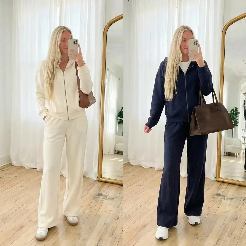 A softly lit mirror selfie in a bright, minimalist studio with sheer white curtains and warm wooden floors. A blonde woman with long, natural hair styles two relaxed matching sets: one in creamy ivory and the other in deep navy. Each look features a zip-up jacket and wide-leg pants paired with crisp white sneakers and a structured brown leather handbag. Effortless, polished, and timeless, the outfits reflect modern comfort with an understated “old money” aesthetic. Natural light, neutral tones, and clean lines create a calm, elevated everyday style moment.

⸻

HASHTAGS

#quietluxury
#effortlessstyle
#matchingset
#neutraloutfits
#capsulewardrobe
#everydayfashion
#minimalstyle
#oldmoneyaesthetic
#cozystyle
#traveloutfit
#athleisurewear
#modernclassic
#simpleoutfits
#fallfashion
#winterstyle
#pinterestfashion
#amazonfashion
#wardrobebasics
#elevatedcasual
#ootdinspo

#LTKHoliday #LTKdayinmylife #LTKGiftGuide