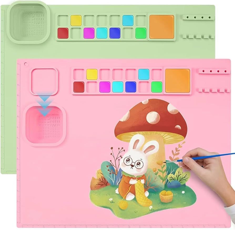 2 Pack Silicone Art Mat for Kids,20"×16"Silicone Painting Mat with Cup,Silicone Craft Mat for Painter Crafter Kids Artist Versatile Non Slip Non Stick Silicone Mat for Resin Casting,Clay(Pink+Green) | Amazon (US)