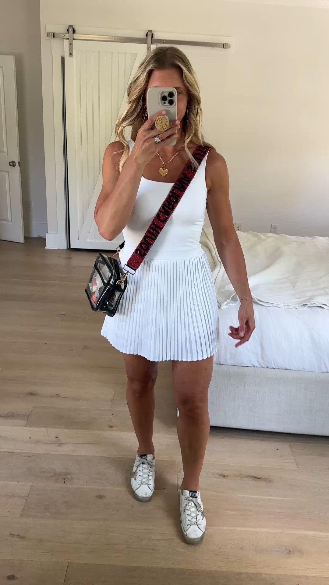 If you’re looking for comfortable things to wear to sporting events or your kid’s games you’ve got to snag this. Wearing this to my son’s football game tonight 🥳 fits true to size. I have a small on. Very comfortable.

•	Made for: light workouts, commute, everyday wear
•	Moves with: moisture-wicking, quick-drying stretchy fabric
•	Must-have features: built-in shorts, U-neck, open back, pull-on closure, UPF 50+ rating
•	Machine wash and tumble dry

#LTKActive #LTKFindsUnder50 #LTKSeasonal