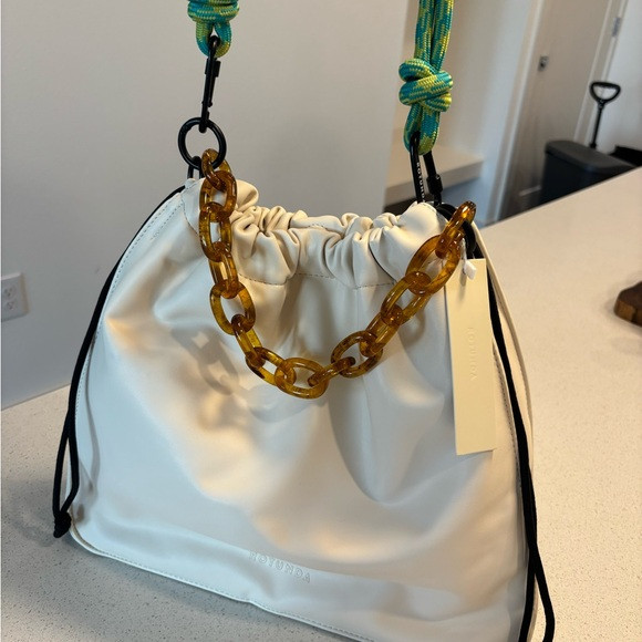 Elegant Cream Handbag with Chain Accent | Poshmark