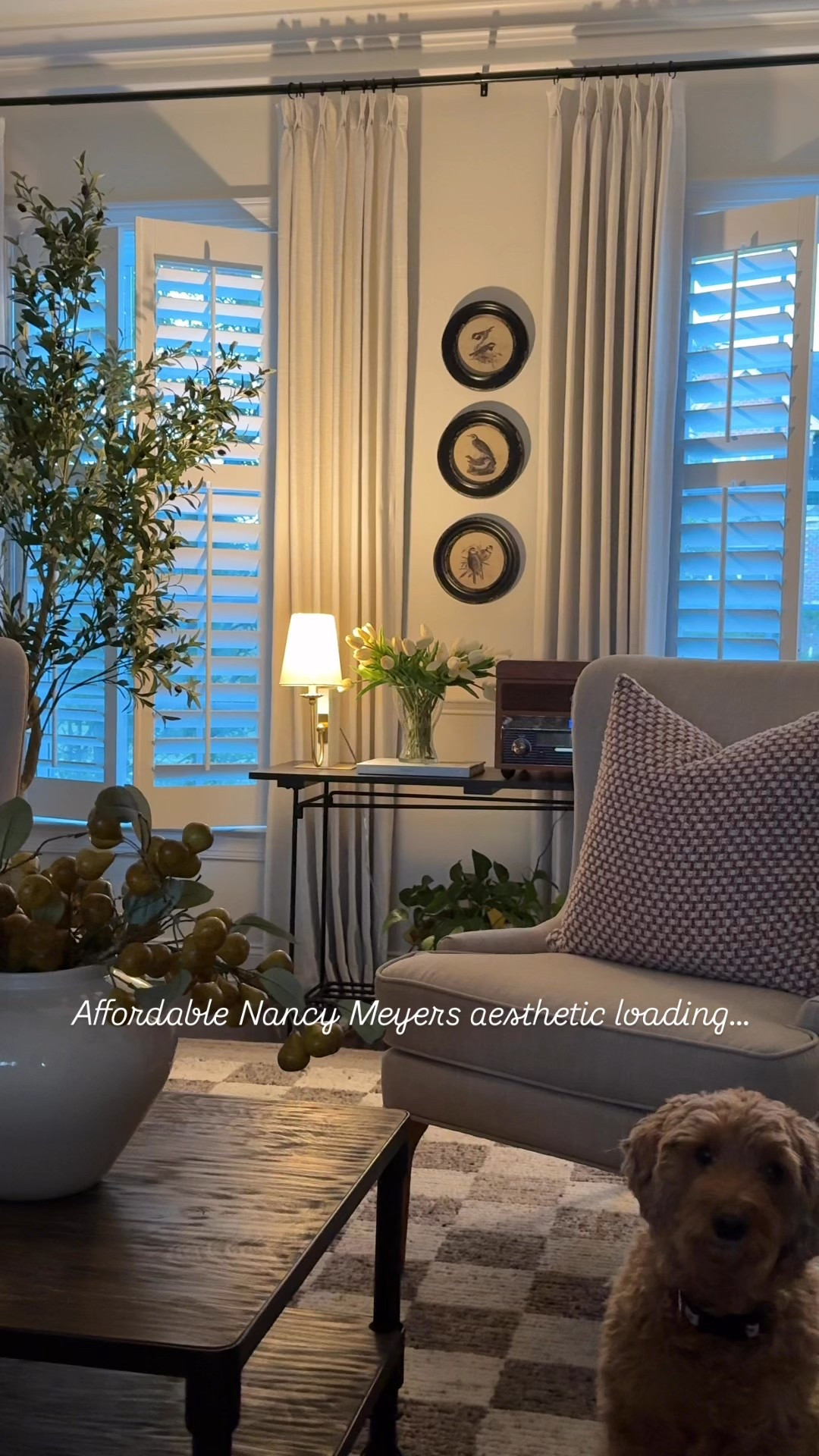 Nancy Meyers affordable decor -  lamps, pillows, chairs, olive trees, pear stems, round framed art, coffee table books, marble dish, record player.  Nancy Meyers aesthetic! 

#LTKSaleAlert #LTKHome #LTKHoliday