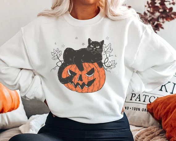 Black Cat on Pumpkin Sweatshirt, Sweater for fall, Black Cat Sweater, Halloween Black Cat Design,... | Etsy (US)