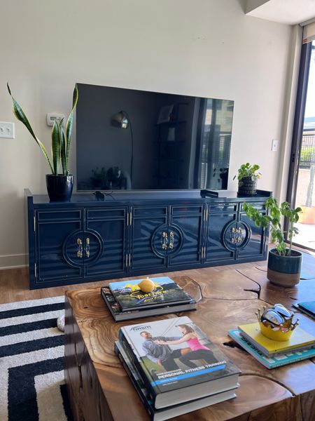 A colorful credenza should take away from the TV. 

#LTKhome #LTKstyletip