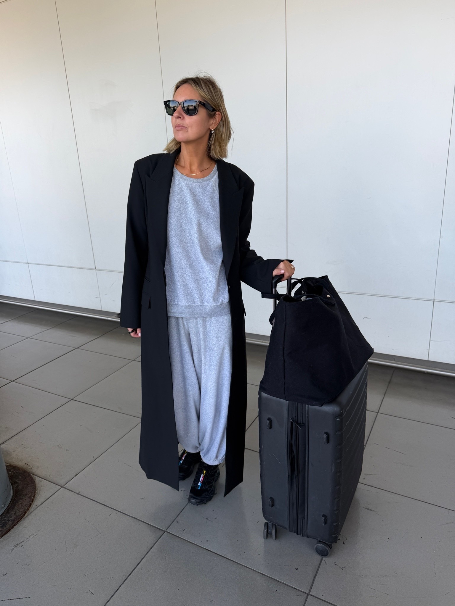 The airport outfit 

airport outfit, travel outfit, grey joggers set, sweatshirt and jogger set, long black coat, oversized coat, chunky trainers, black square sunglasses, comfortable travel style, athleisure, loungewear, effortless travel look, elevated basics, quiet luxury, monochrome styling, neutral color palette, travel day essentials, ltkstyletip, ltktravel, ltkfindsunder100, ltkitbag

#LTKeurope #LTKtravel #LTKstyletip