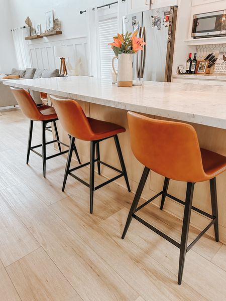 Amazon faux leather barstools. Revamp your kitchen or space after Christmas with new barstools that are sleek and easy to clean. Love the MCM style of these!

#LTKstyletip #LTKsalealert #LTKhome