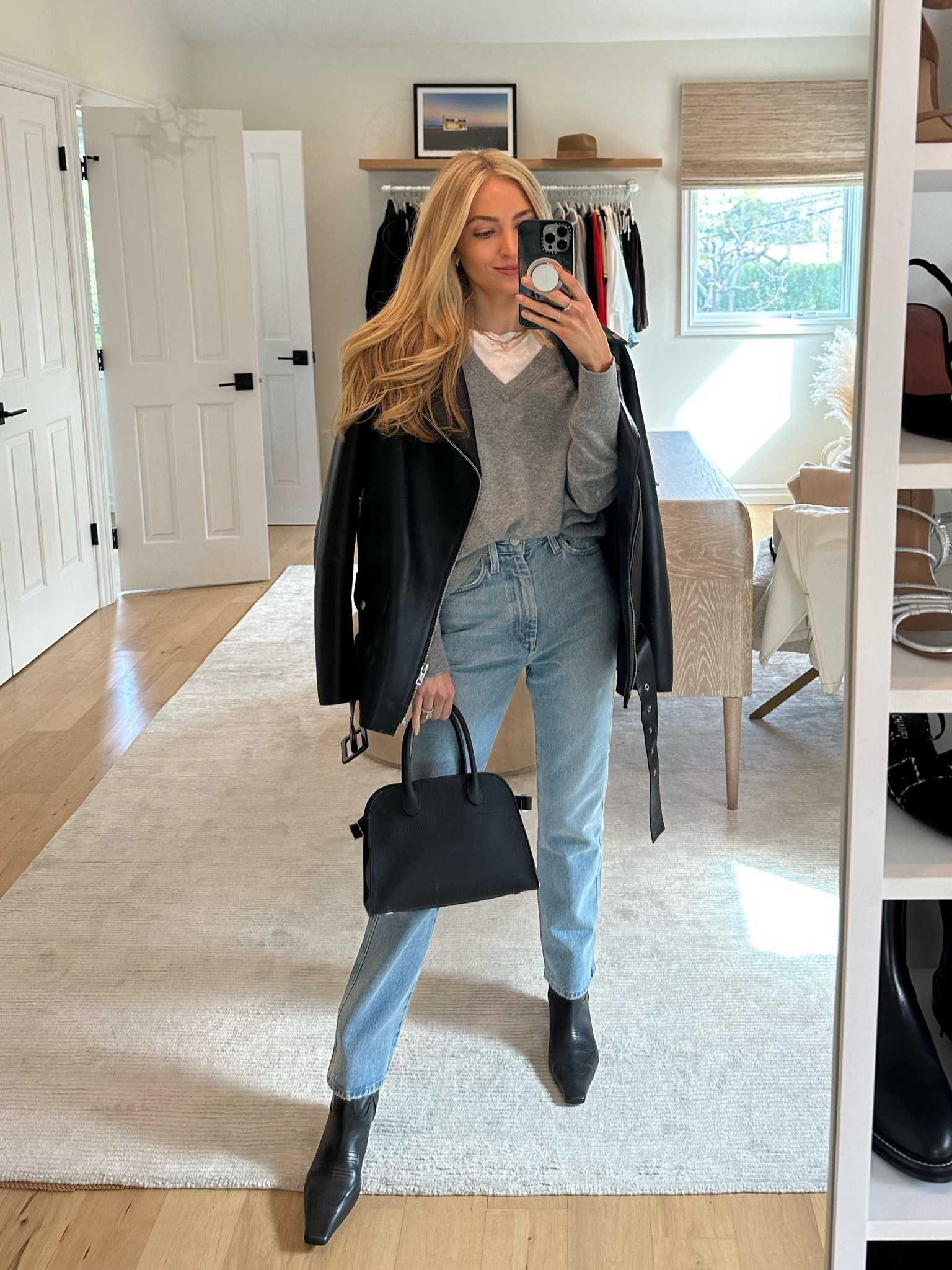 Busy day with a few appts followed by a casual dinner so this is what I’m wearing! 
This is my go to when I don’t know what to grab - good spring transitional situation too 🤌🏼

Use code SE15 for 15% off the sweater and anything else Jenni Kayne!

Sizes worn here:
Tee S
Jacket S/M (oversized & long!)
Jeans 23 (TTS)
Boots 39.5 (TTS)

#LTKSeasonal #LTKshoecrush #LTKstyletip