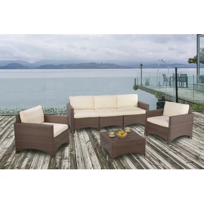 Ashlyn 4 Piece Rattan Sectional Seating Group with Cushions | Wayfair North America