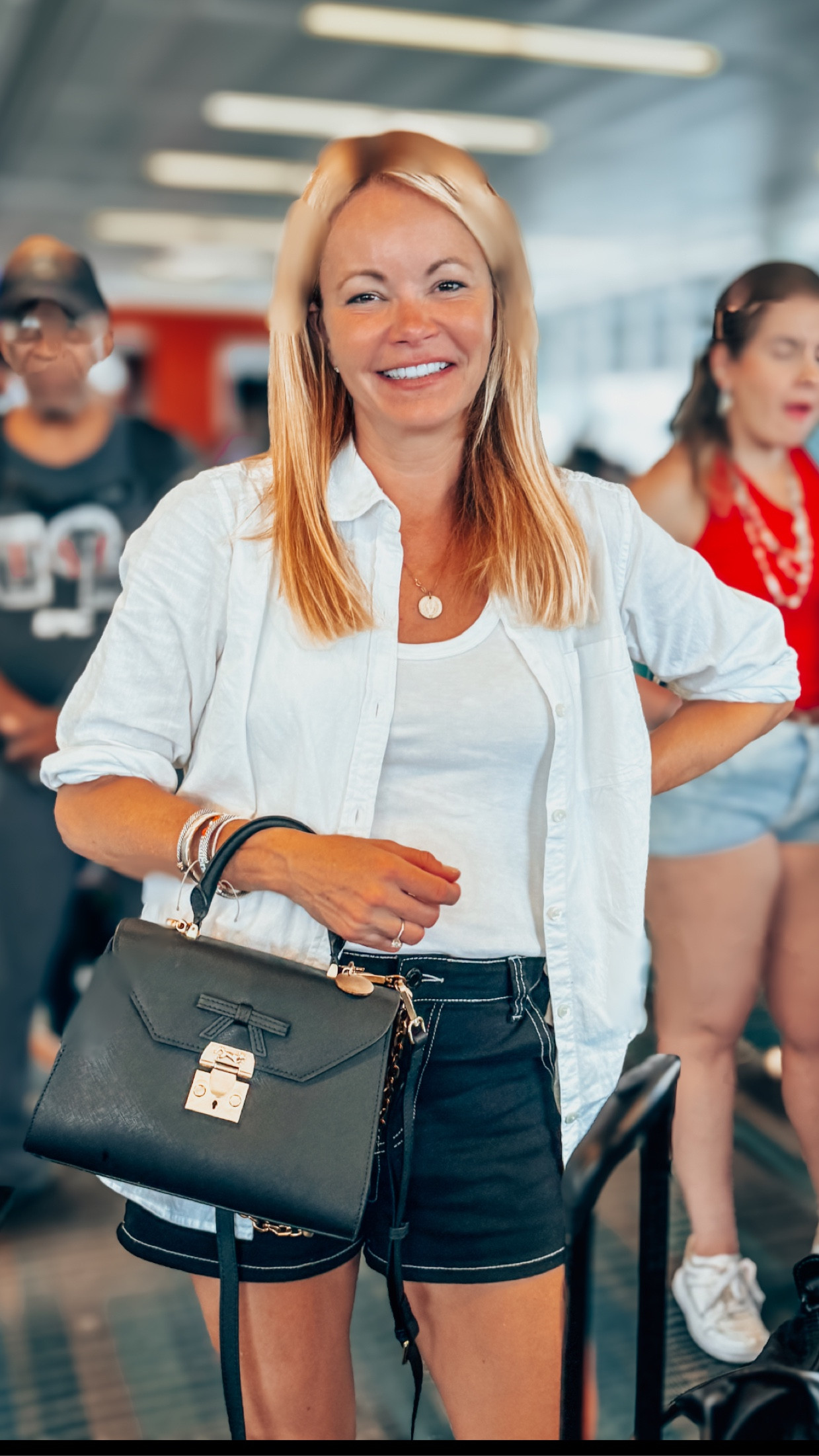 Black and white outfit. Travel outfit.  Summer outfit. White button down. Black purse. Black shorts. MME.Mink.

#LTKtravel #LTKover40 #LTKitbag