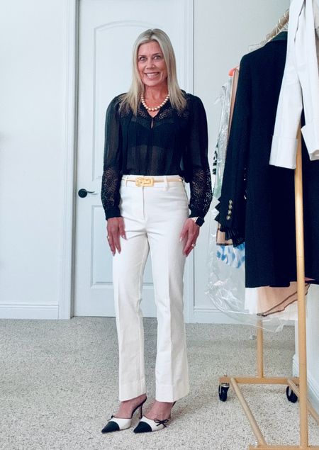 #OOTD polished spring look with black chiffon blouse, off-white cropped flare pants with black & white mules.

#LTKSeasonal #LTKover40