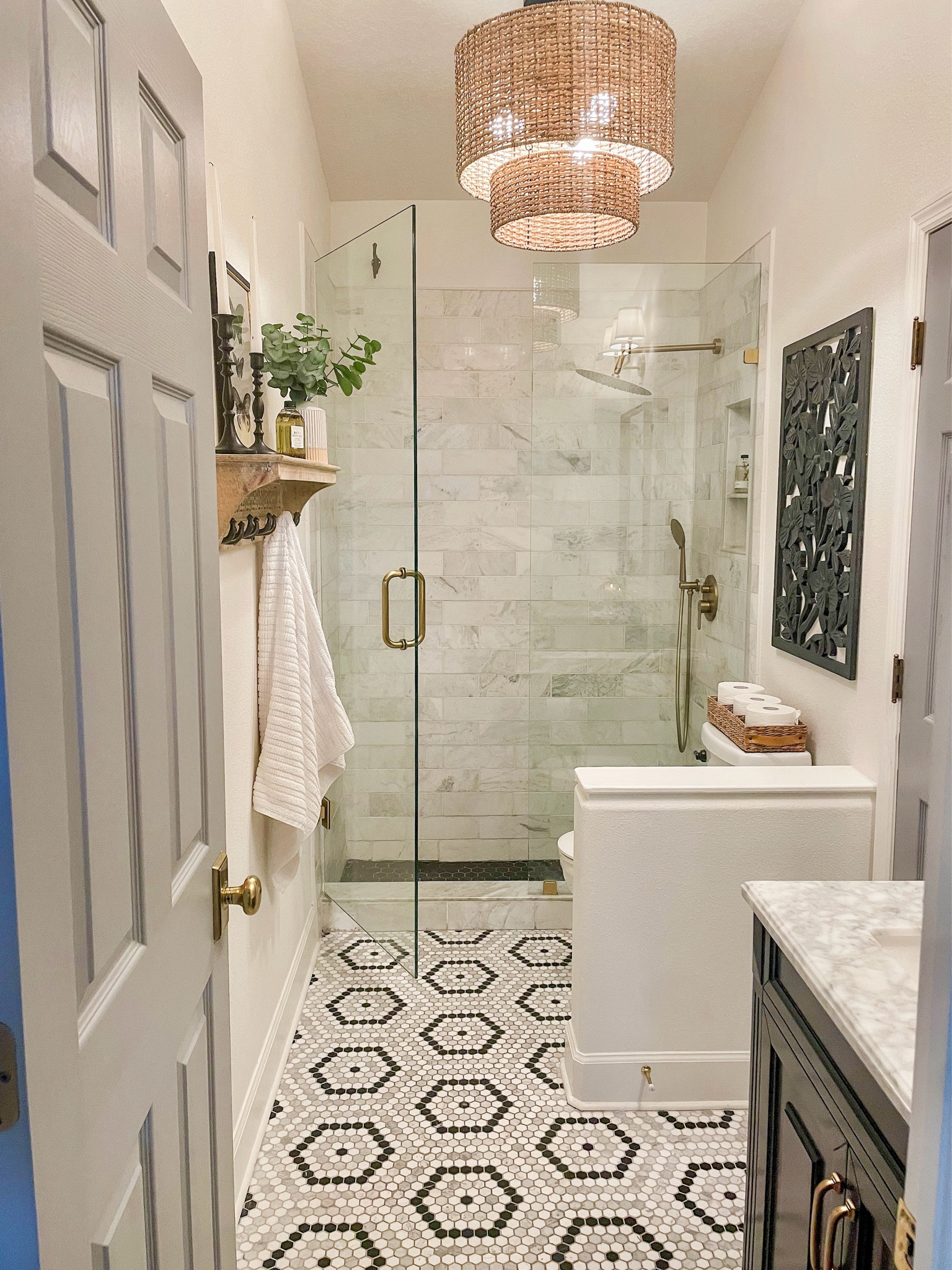 Bathroom vanity, knobs and pulls, basket light, door knob, bathroom decor, bathroom fixtures. 

The tile is from Floor and Decor - Cafe Du Monet Carrara mosaic. 

#LTKHome