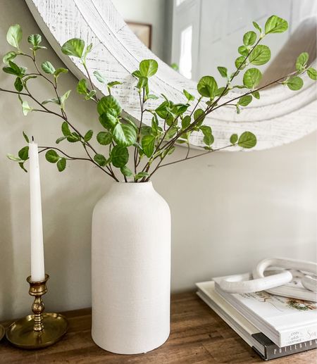 Spring faux flowers are an inexpensive way to decorate for spring as you can use them year after year!

Target style home.  White vase.  Faux green stems.  

#LTKSeasonal #LTKhome #LTKunder50
