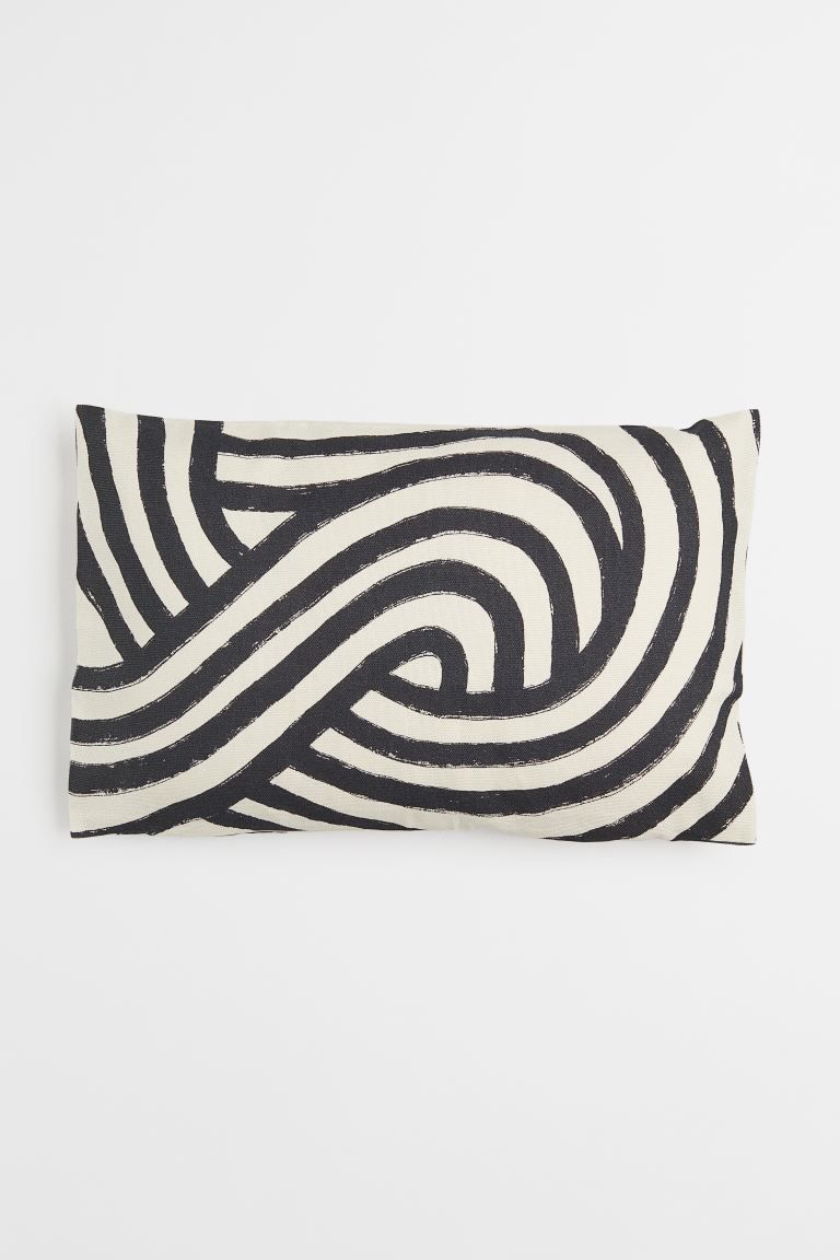 Conscious choiceCushion cover in cotton canvas with an all-over print on both sides and concealed... | H&M (UK, MY, IN, SG, PH, TW, HK)