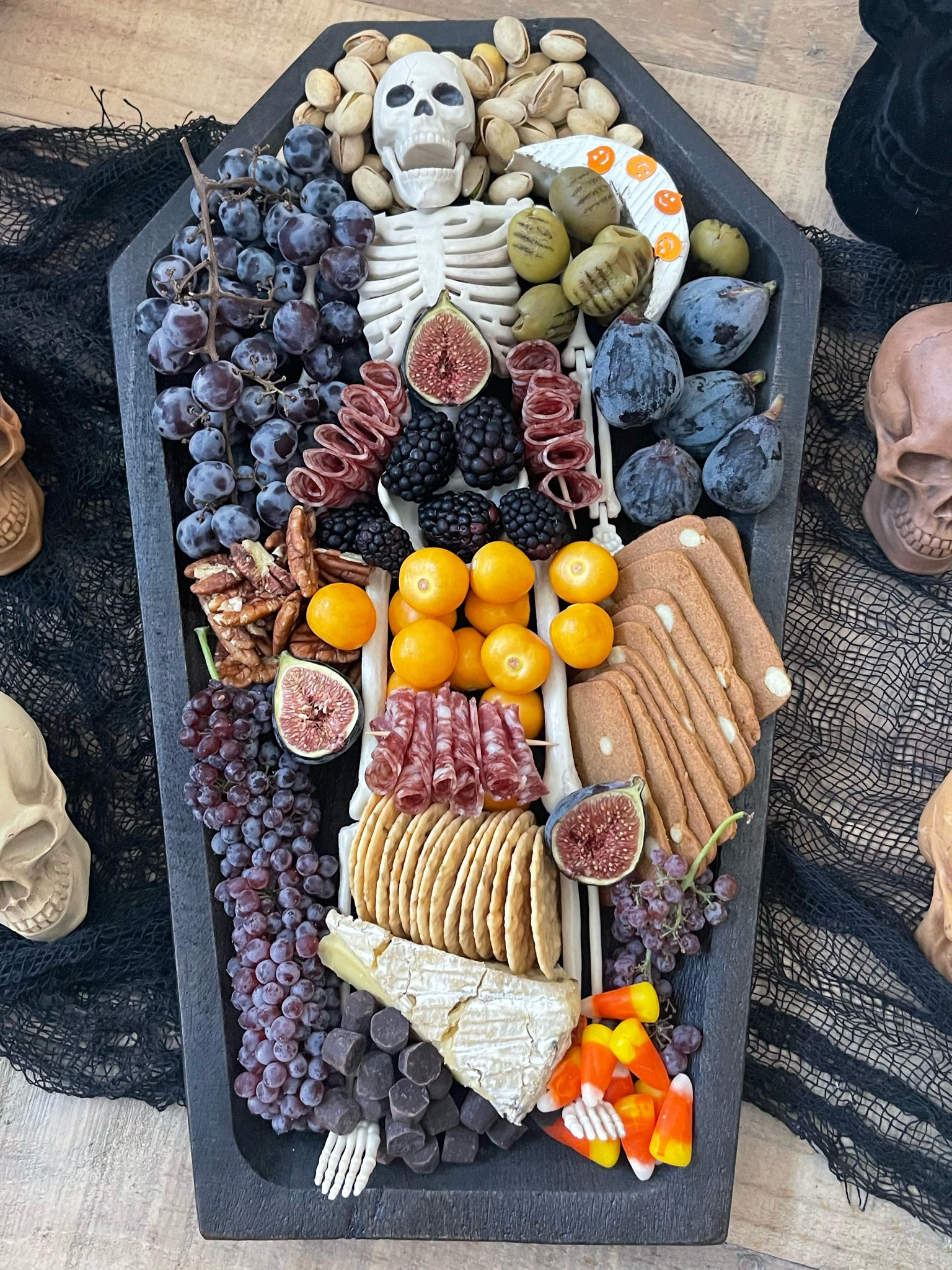 Halloween coffin charcuterie board. This board I got a homegoods and couldn’t link but I’ve found a similar one 
Halloween decor - Halloween home - Halloween party 

#LTKSeasonal #LTKparties #LTKHalloween