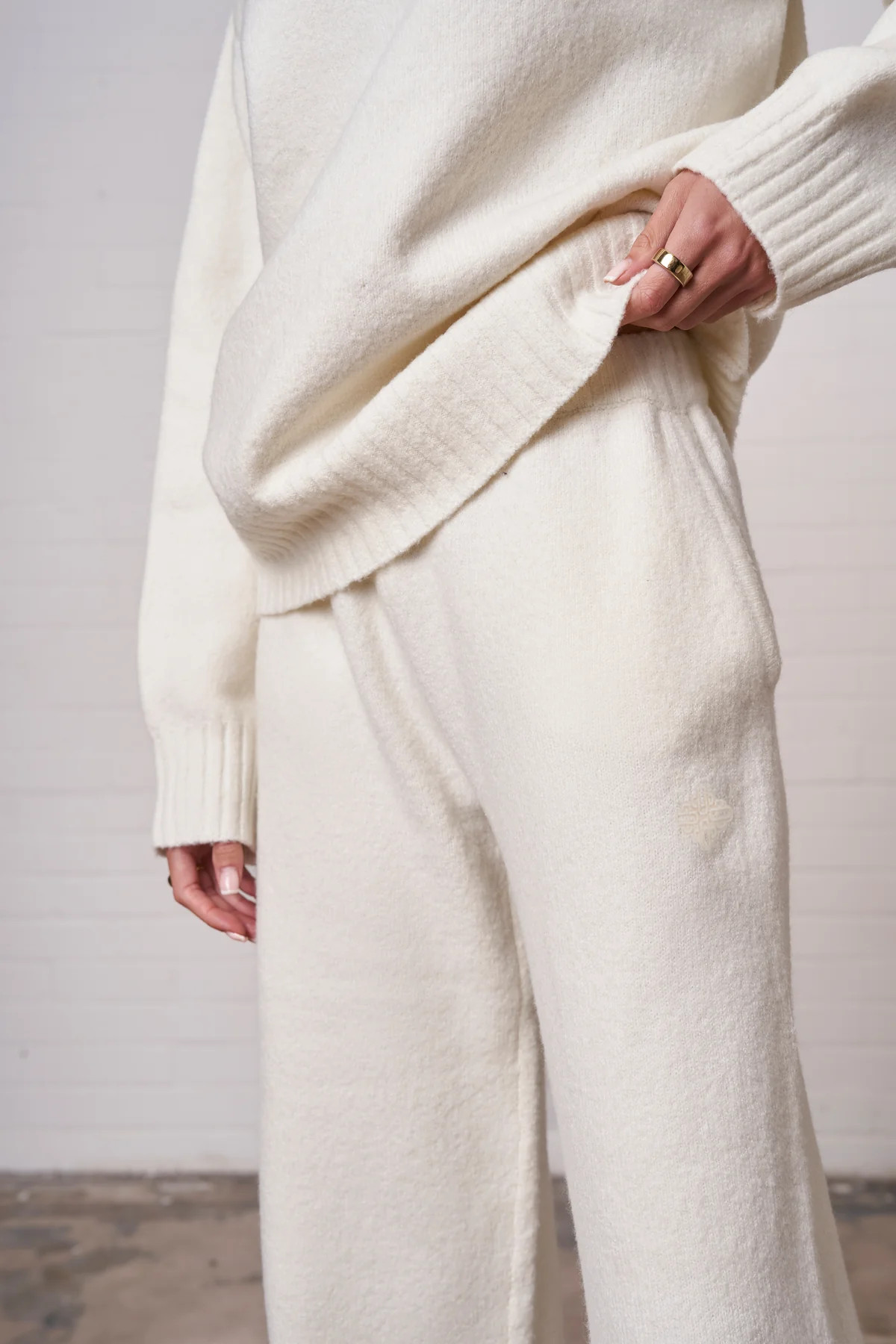 FLUFFY KNIT EMBLEM EMBROIDERED JOGGER - OFF-WHITE | The Couture Club