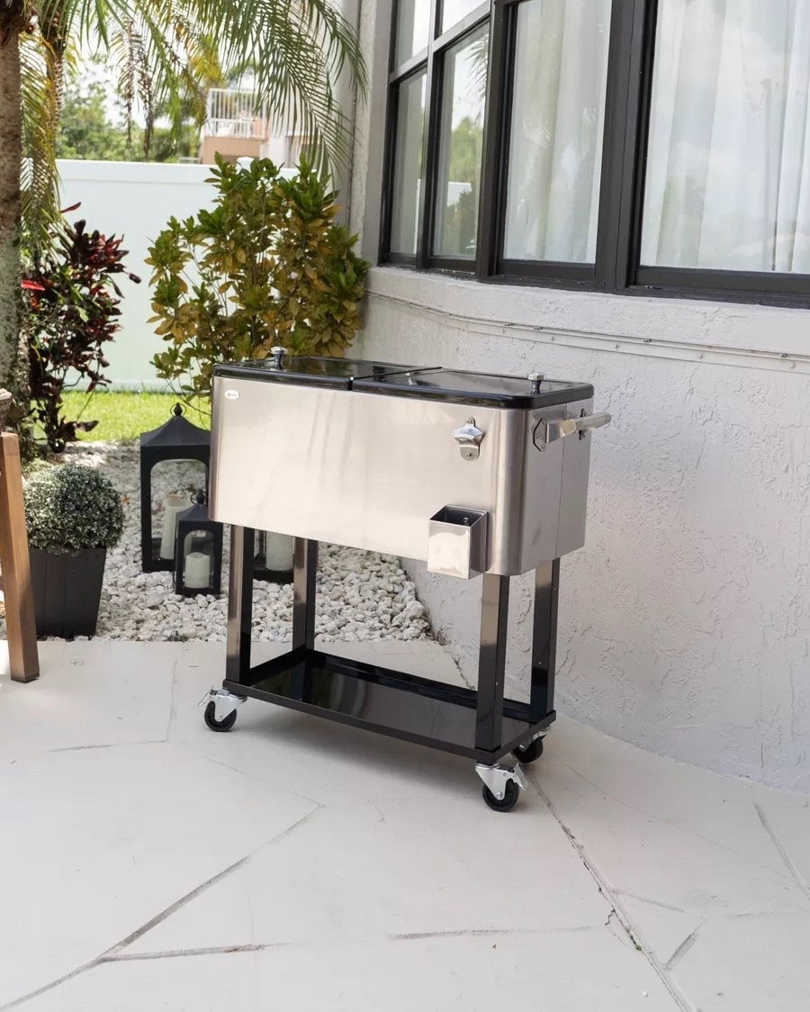 If you host a lot, you need this cooler. Roomy enough for a full party's worth of drinks, easy to roll wherever you need it, and it comes in a bunch of color options.

drink cooler, entertaining essentials, party must haves, patio finds, outdoor entertaining, hosting hacks, rolling cooler, backyard party, summer hosting, Wayfair

#LTKHome #LTKfoodie